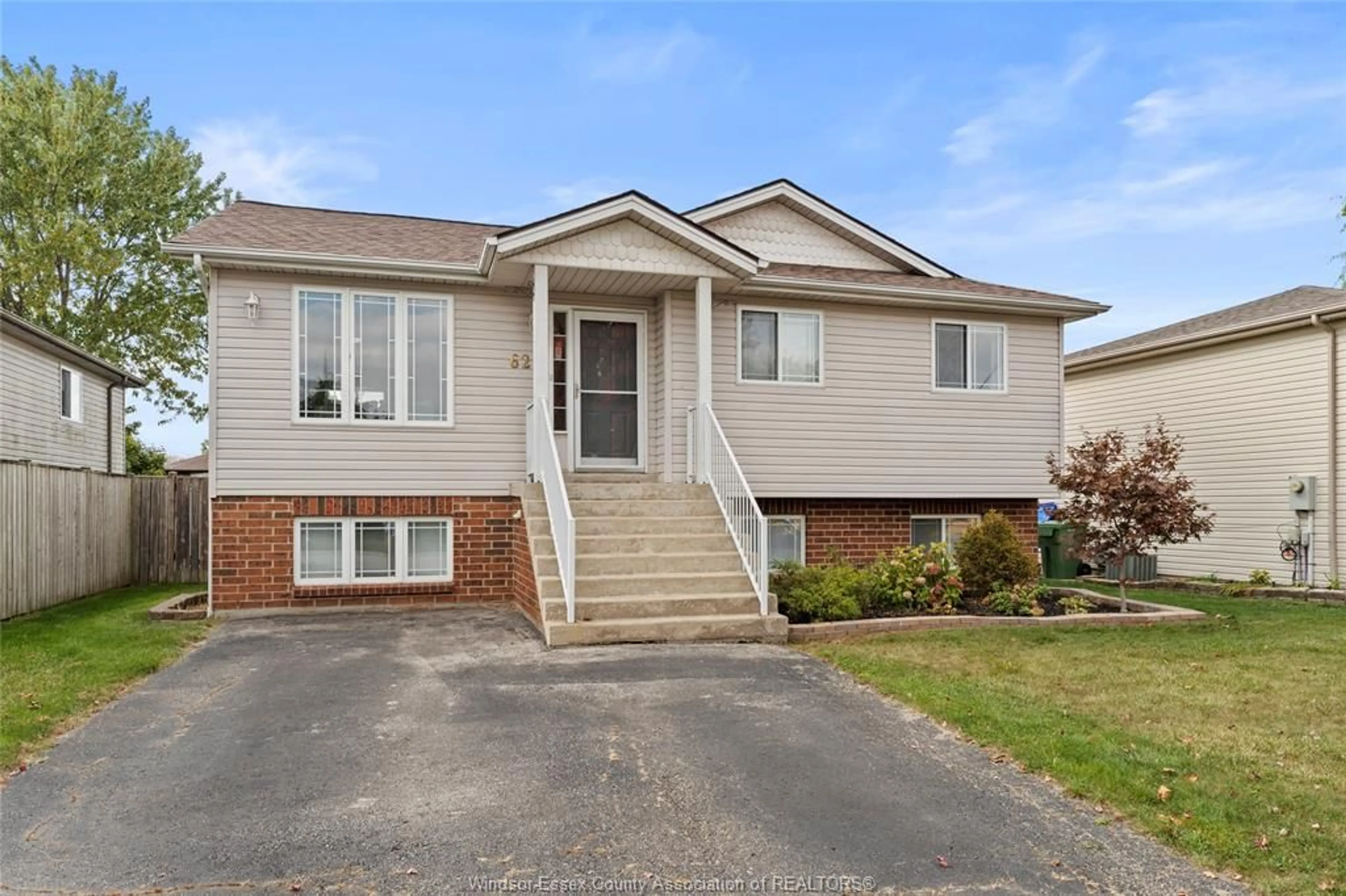 Home with vinyl exterior material, street for 62 BRATT Dr, Amherstburg Ontario N9V 4A2