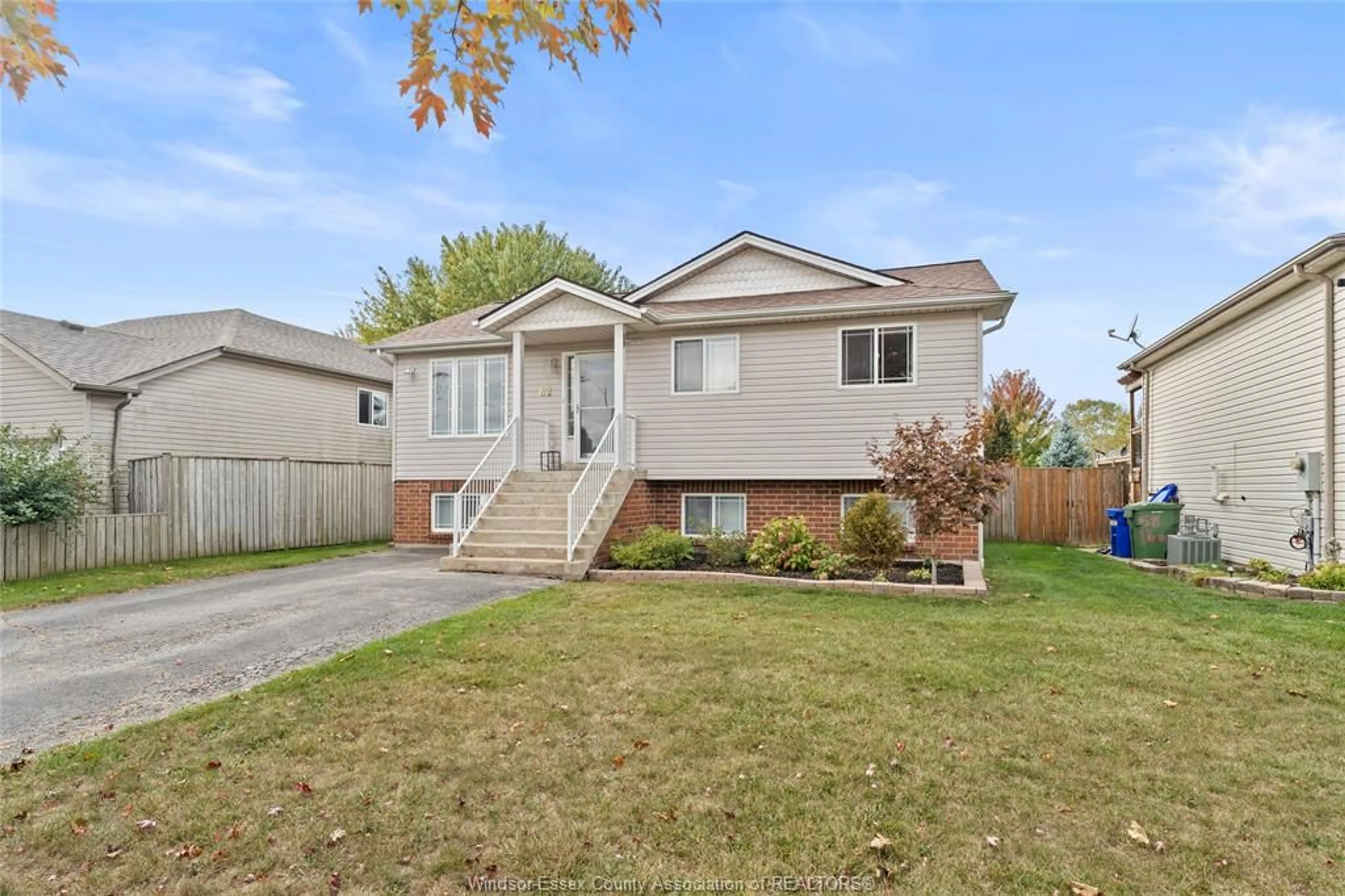 Home with vinyl exterior material, street for 62 BRATT Dr, Amherstburg Ontario N9V 4A2