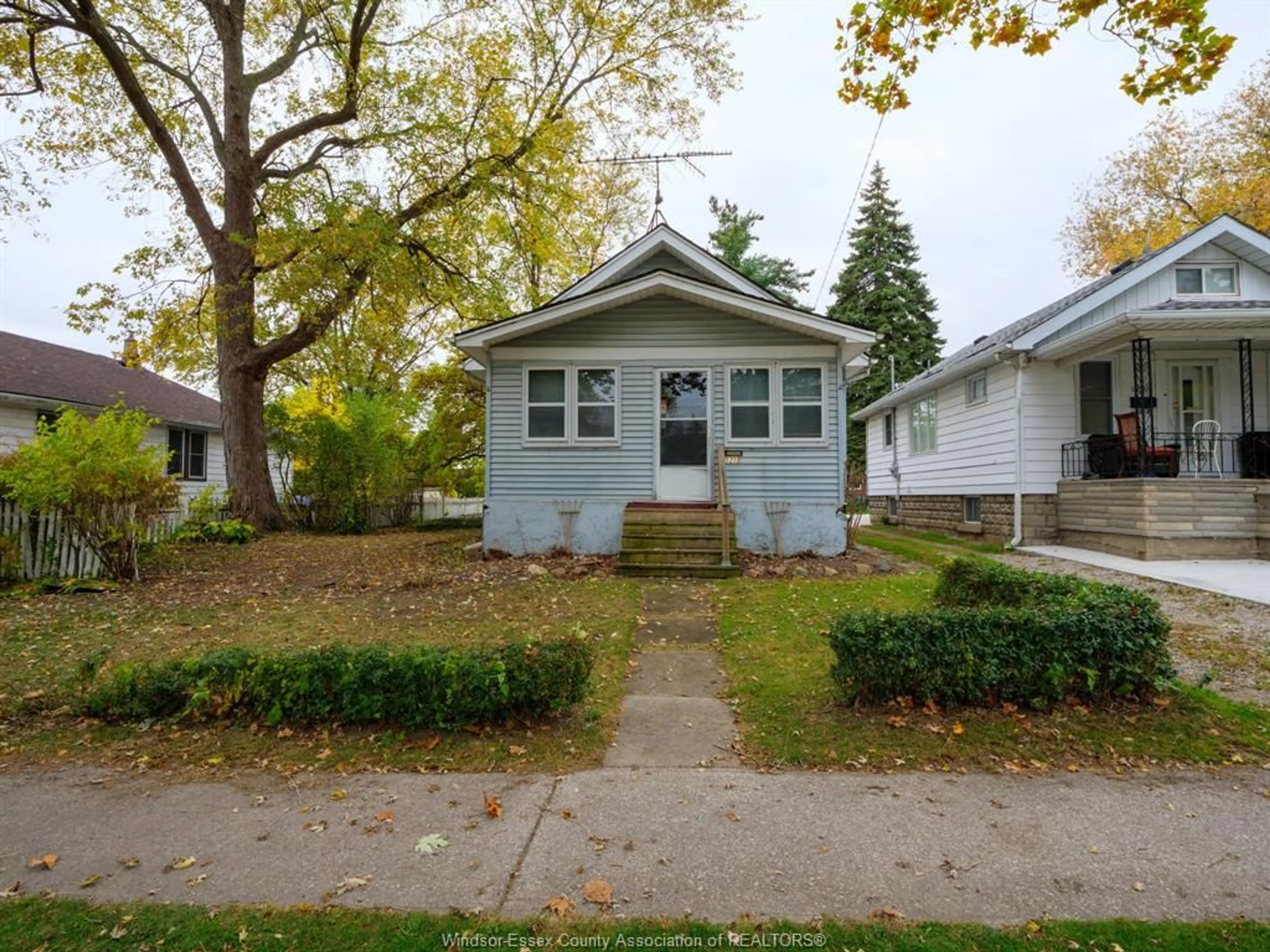 Home with vinyl exterior material, street for 1215 WIGLE Ave, Windsor Ontario N9C 3M9