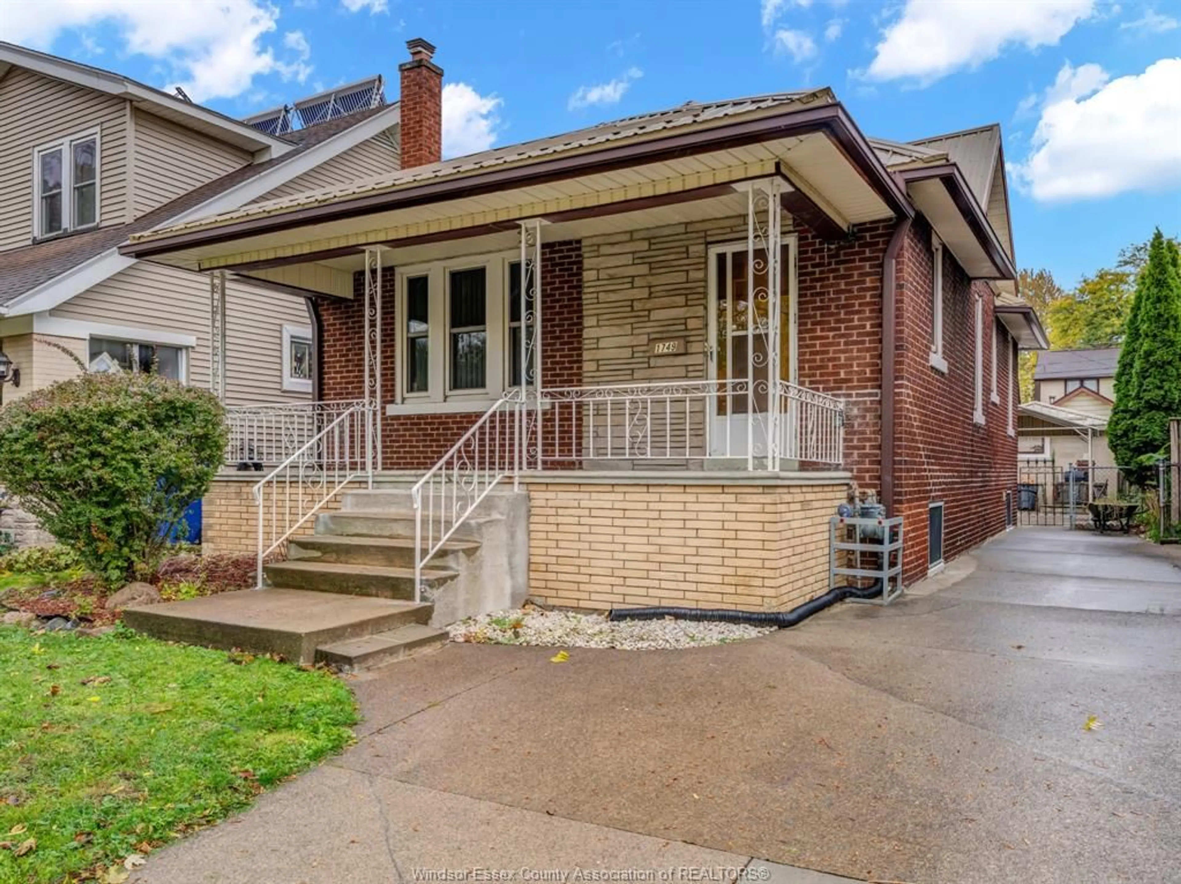 Home with brick exterior material, street for 1749 IROQUOIS, Windsor Ontario N8Y 1S1