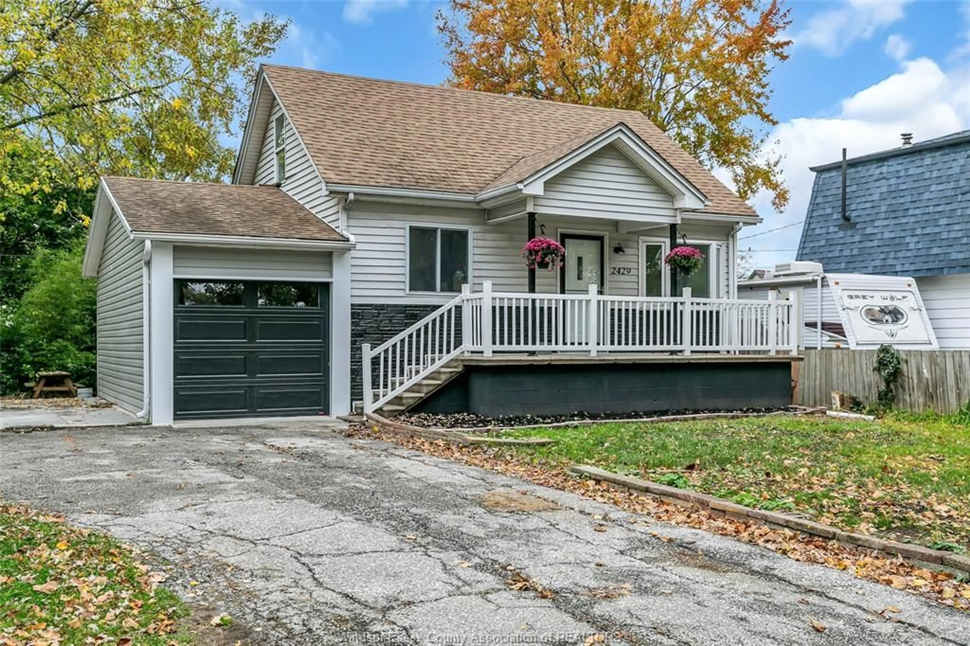 Home with vinyl exterior material, street for 2429 ALEXIS, Windsor Ontario N8W 3Z4