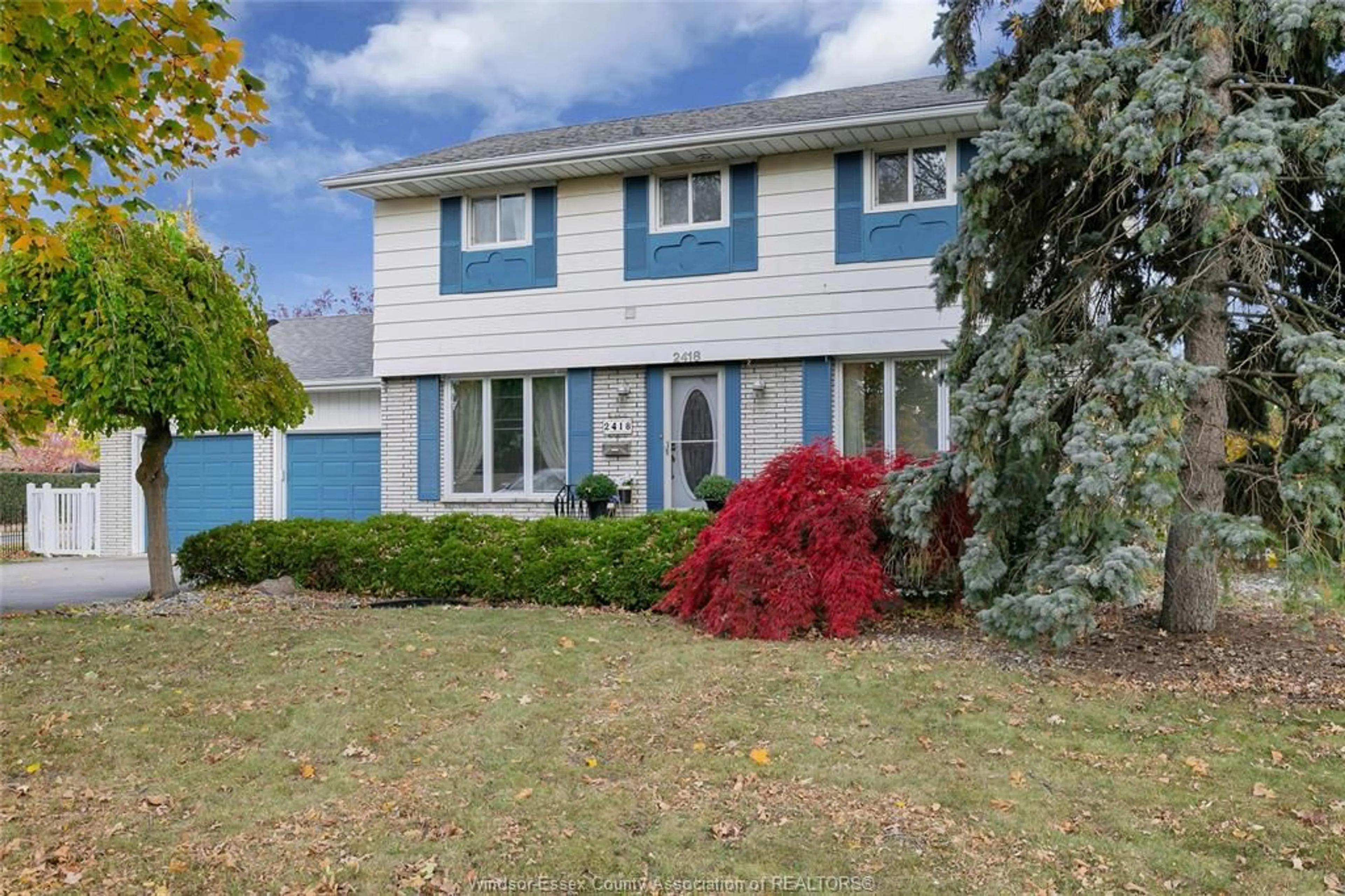 Home with vinyl exterior material, street for 2418 MARK Ave, Windsor Ontario N9E 2W3