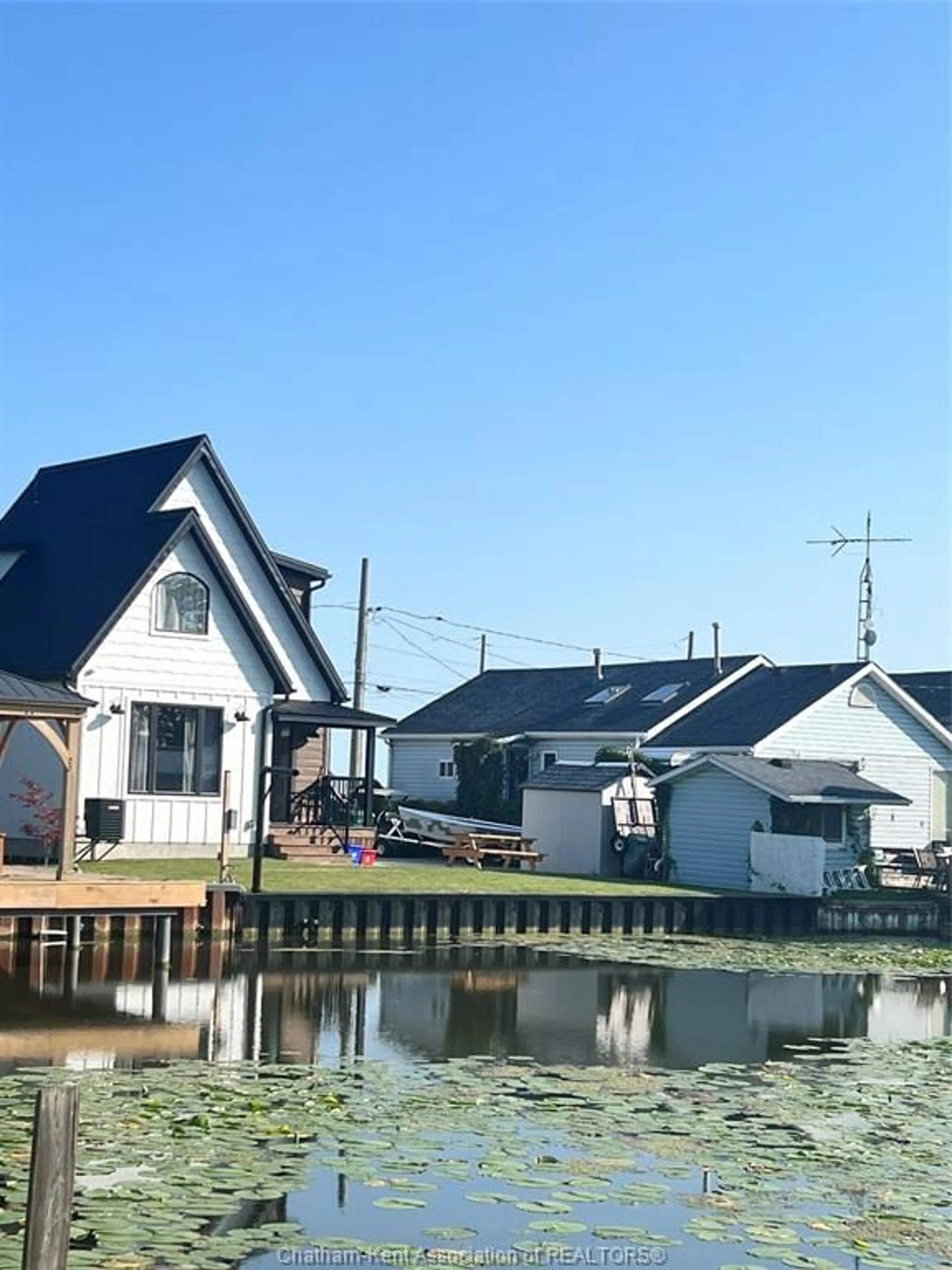 A pic from outside/outdoor area/front of a property/back of a property/a pic from drone, water/lake/river/ocean view for 19260 Lakeside Dr, Lighthouse Cove Ontario N0P 2L0