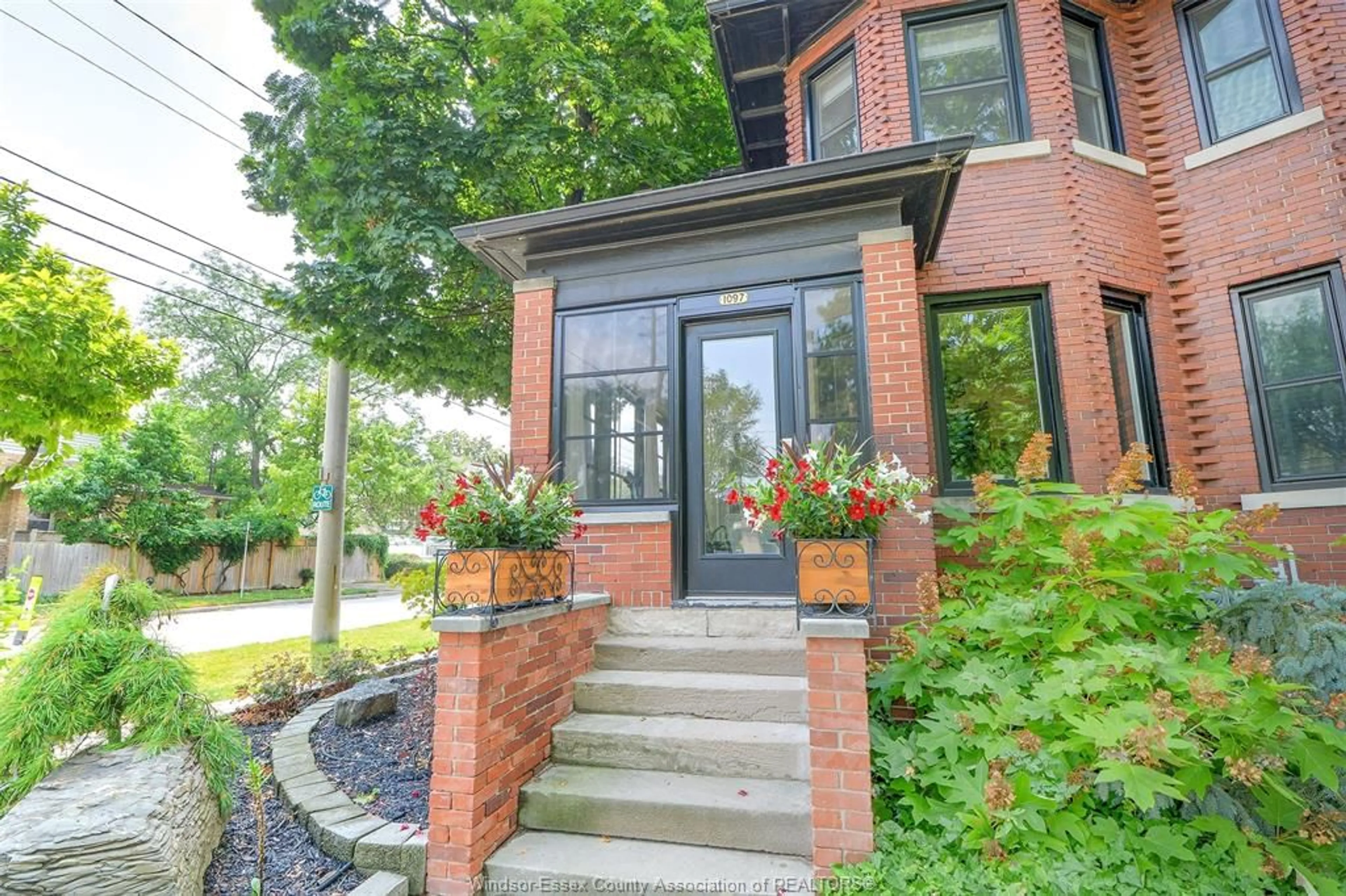 Home with brick exterior material, street for 1097 CHILVER Rd, Windsor Ontario N8Y 2K6