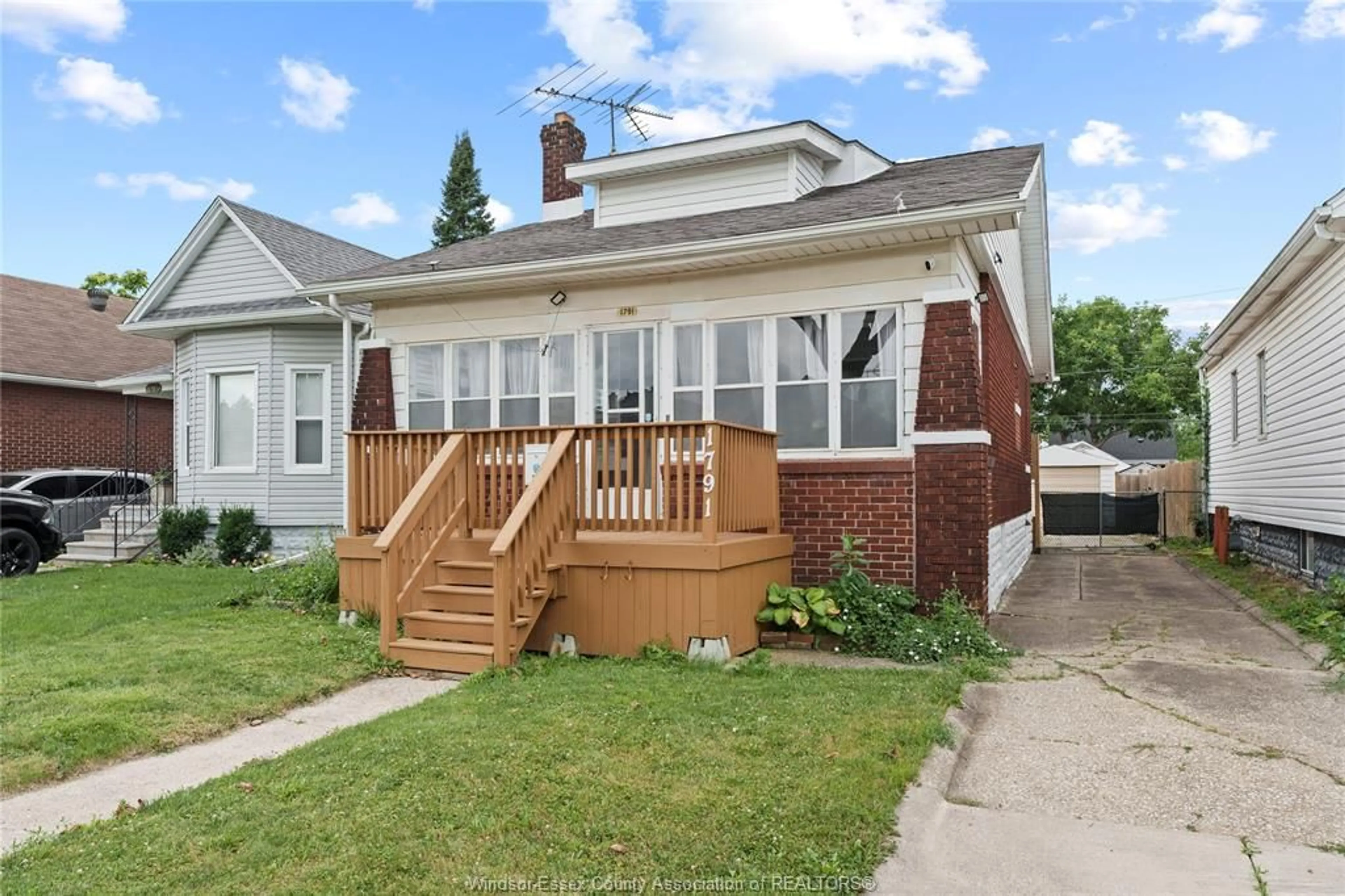 Home with brick exterior material, street for 1791 HALL, Windsor Ontario N8W 2L5