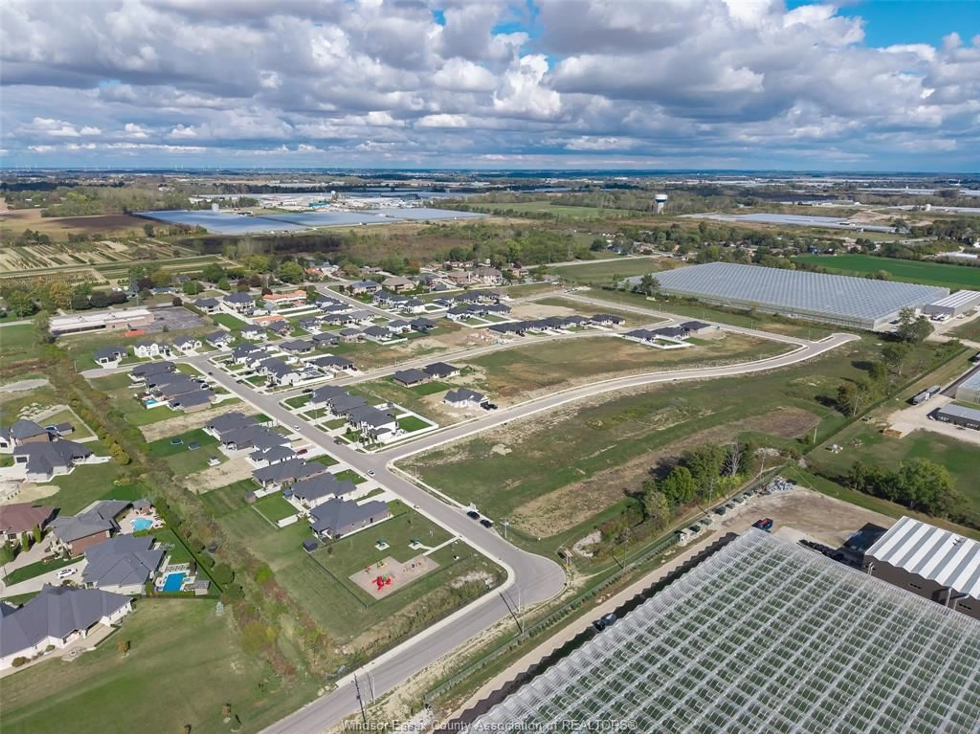 A pic from outside/outdoor area/front of a property/back of a property/a pic from drone, water/lake/river/ocean view for 1852 MOLISE Blvd, Kingsville Ontario N9Y 0G6