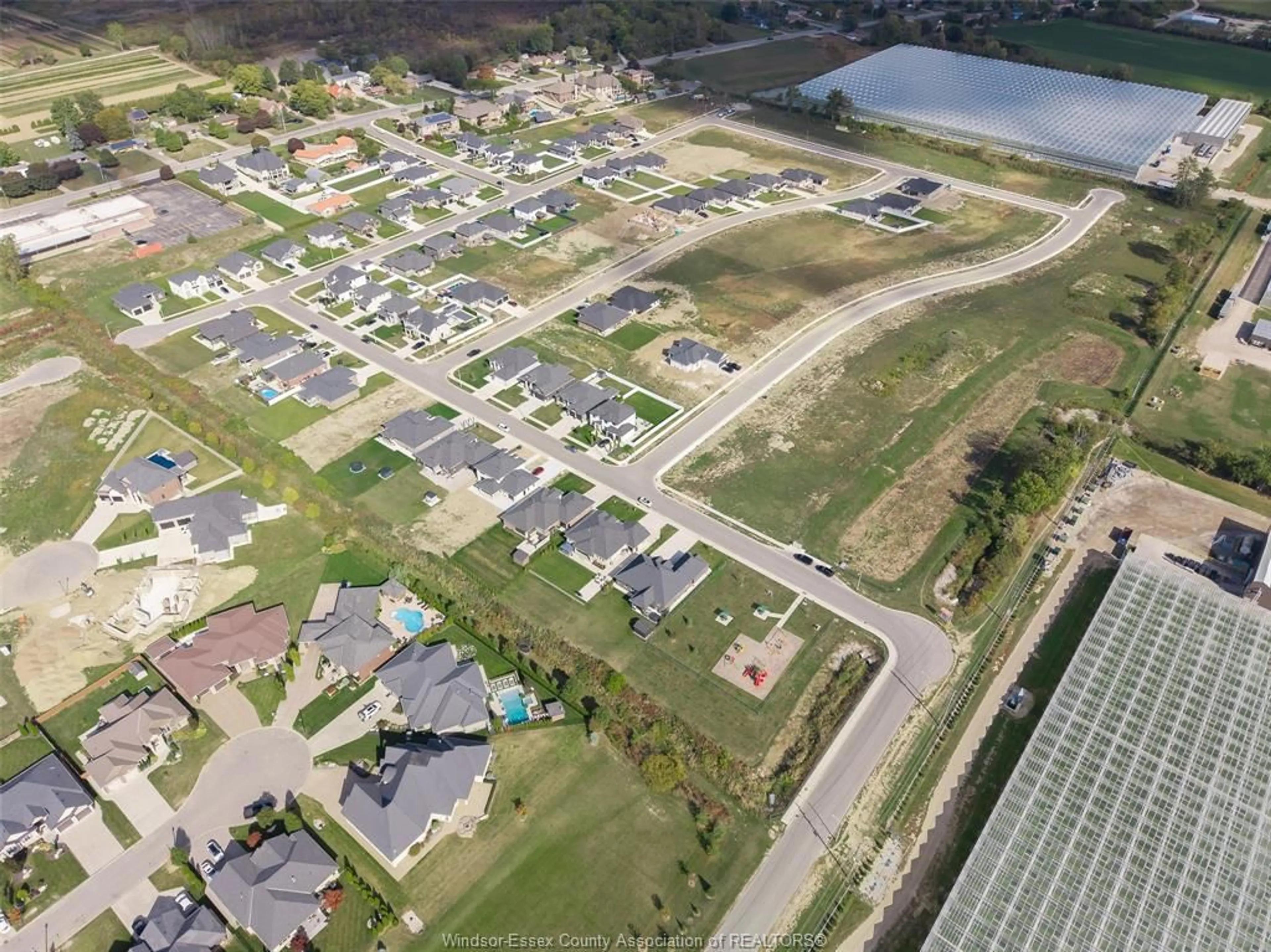 A pic from outside/outdoor area/front of a property/back of a property/a pic from drone, street for 1852 MOLISE Blvd, Kingsville Ontario N9Y 0G6