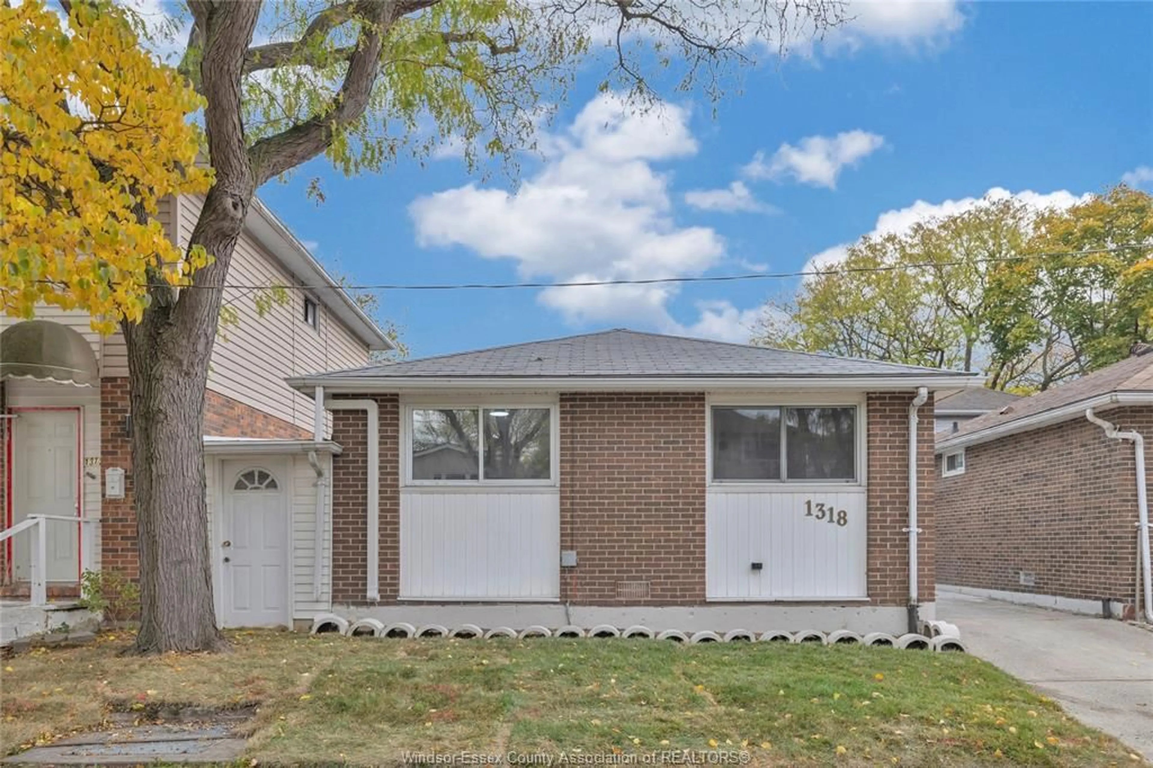 Home with brick exterior material, street for 1318 BAYSWATER Cres, Windsor Ontario N8S 4K6