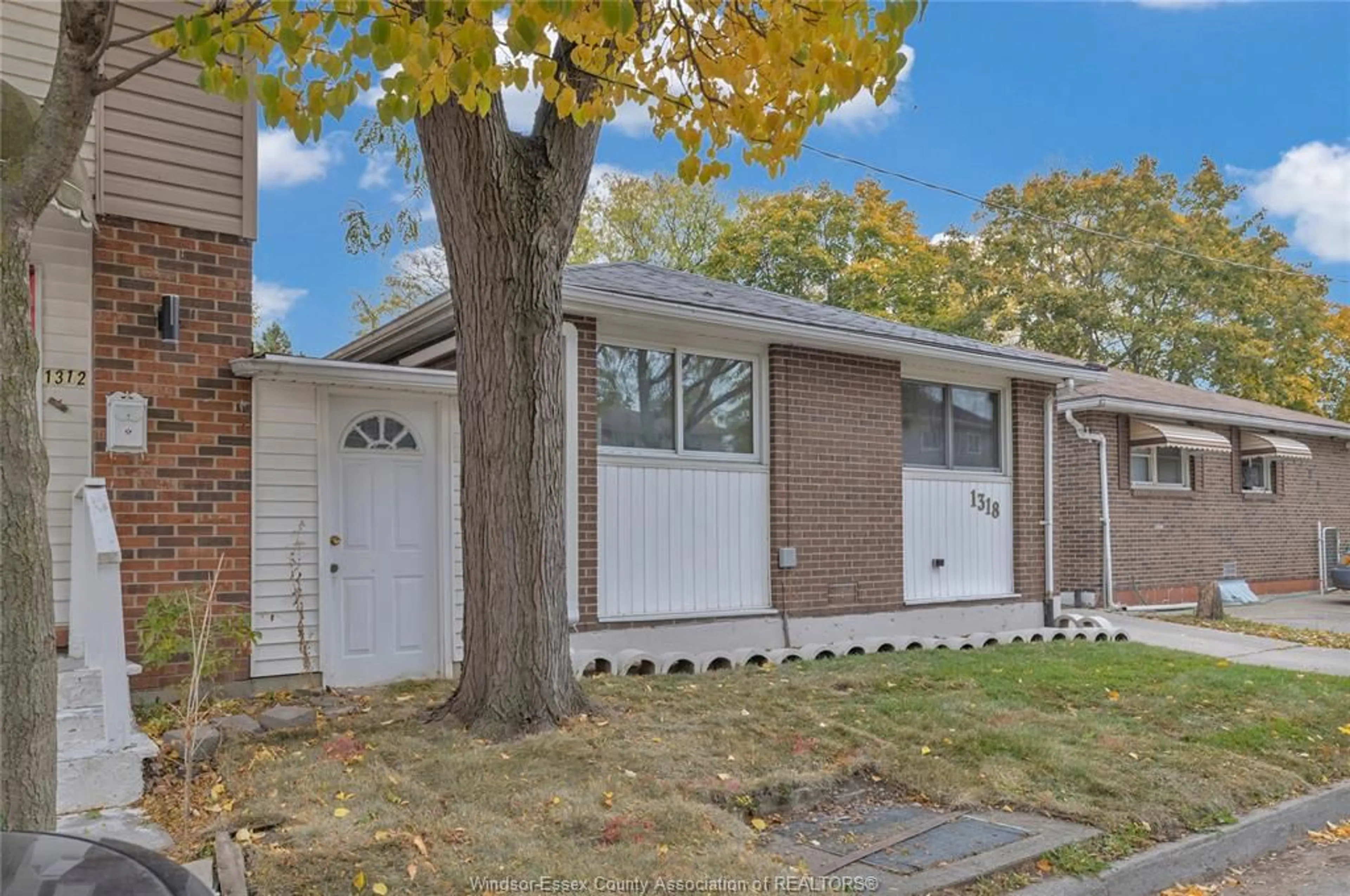 Home with brick exterior material, street for 1318 BAYSWATER Cres, Windsor Ontario N8S 4K6