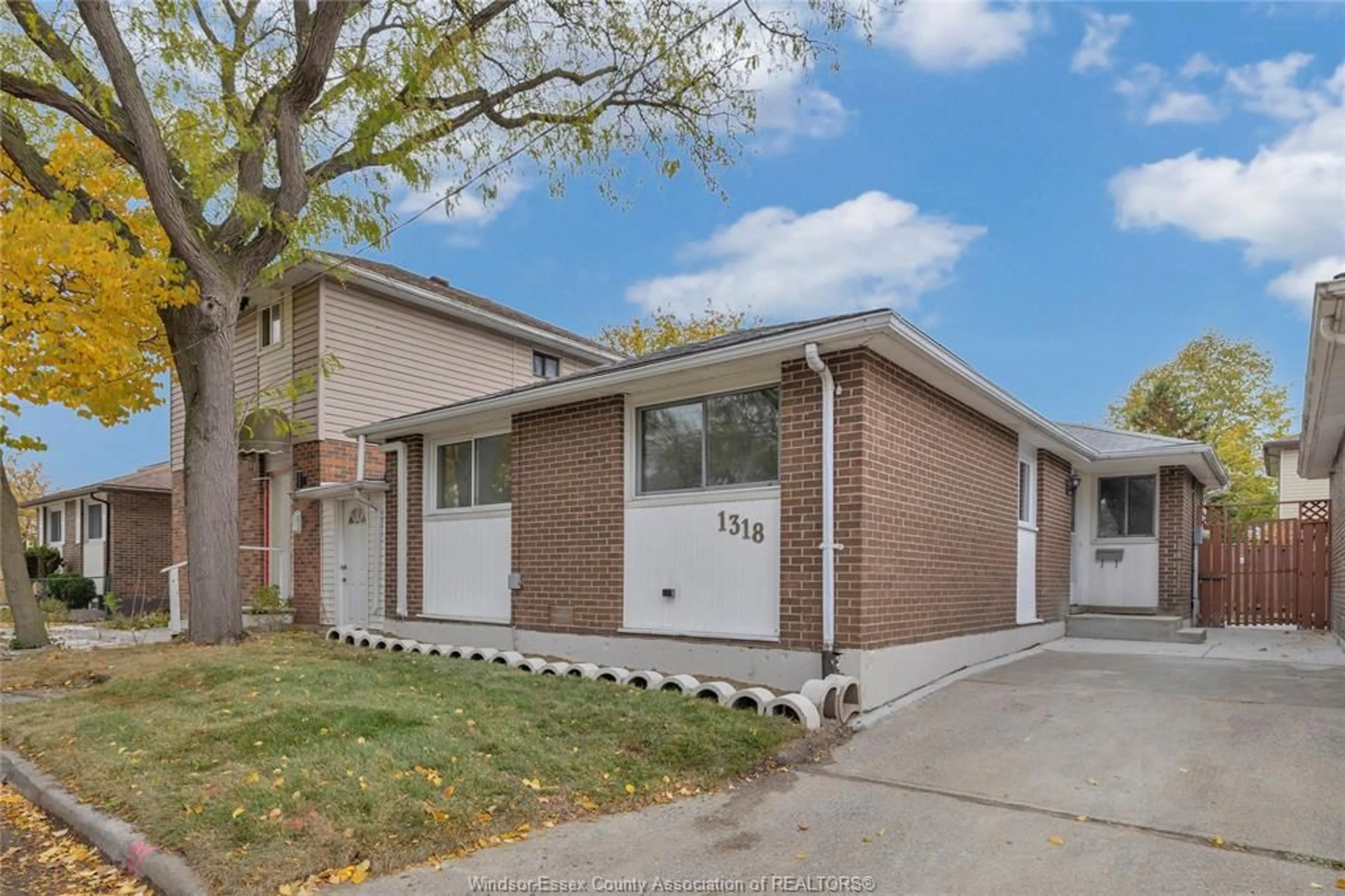 Home with brick exterior material, street for 1318 BAYSWATER Cres, Windsor Ontario N8S 4K6