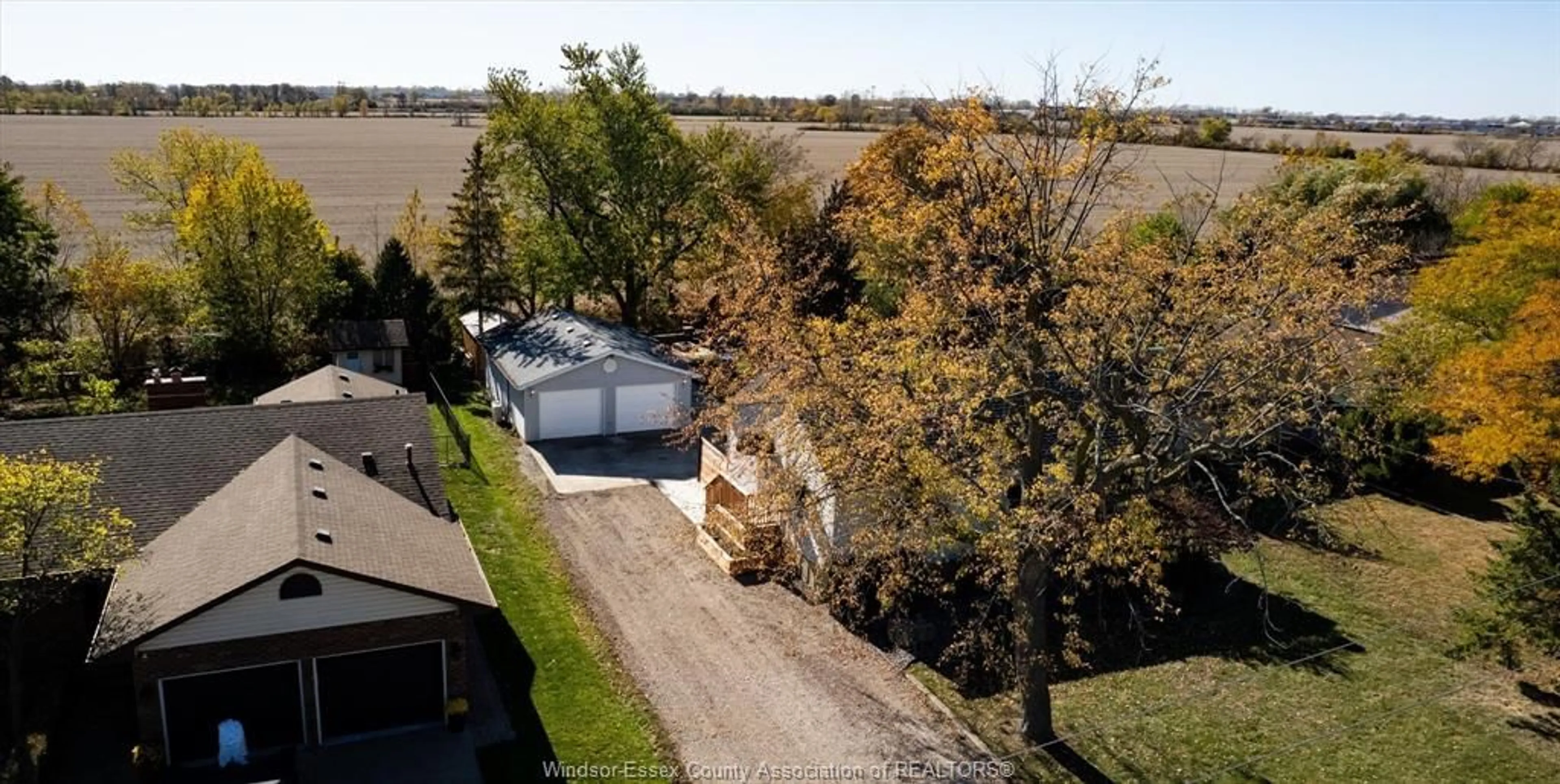 A pic from outside/outdoor area/front of a property/back of a property/a pic from drone, street for 4095 BASELINE, Windsor Ontario N9A 6J3