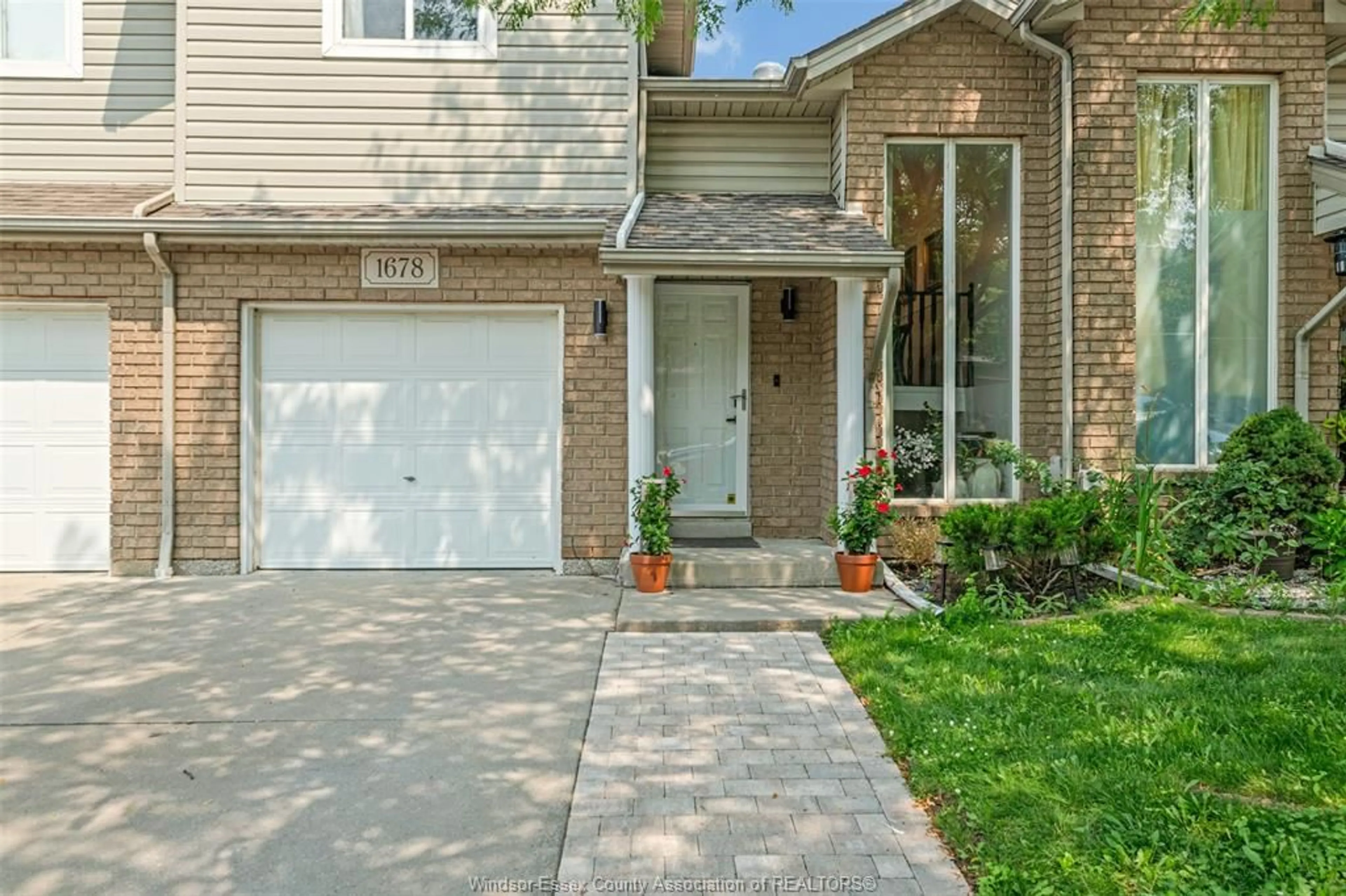 Home with brick exterior material, street for 1678 FIELDCREST, Tecumseh Ontario N8N 4Z8