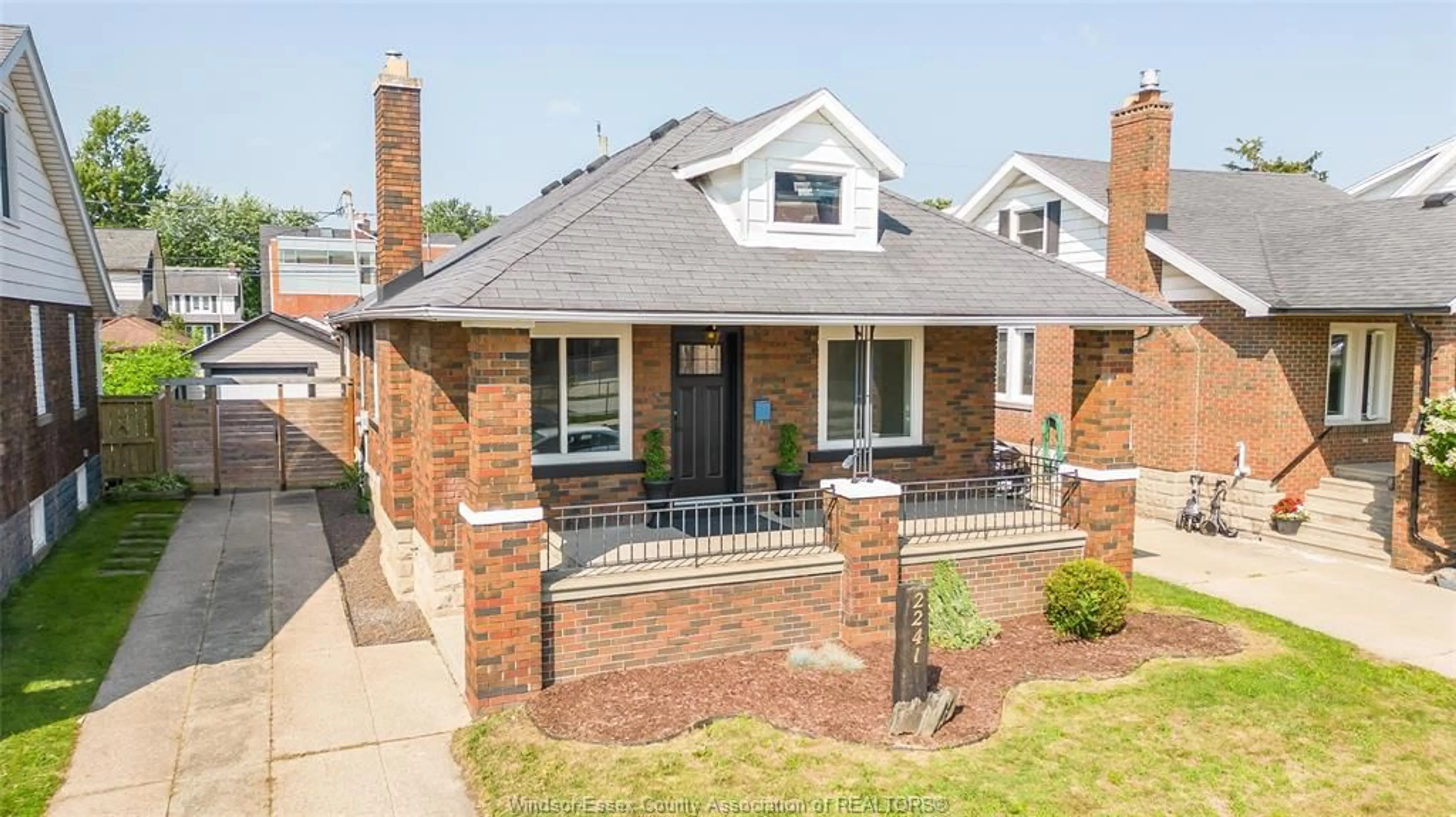Home with brick exterior material, street for 2241 WINDERMERE Rd, Windsor Ontario N8W 2S7