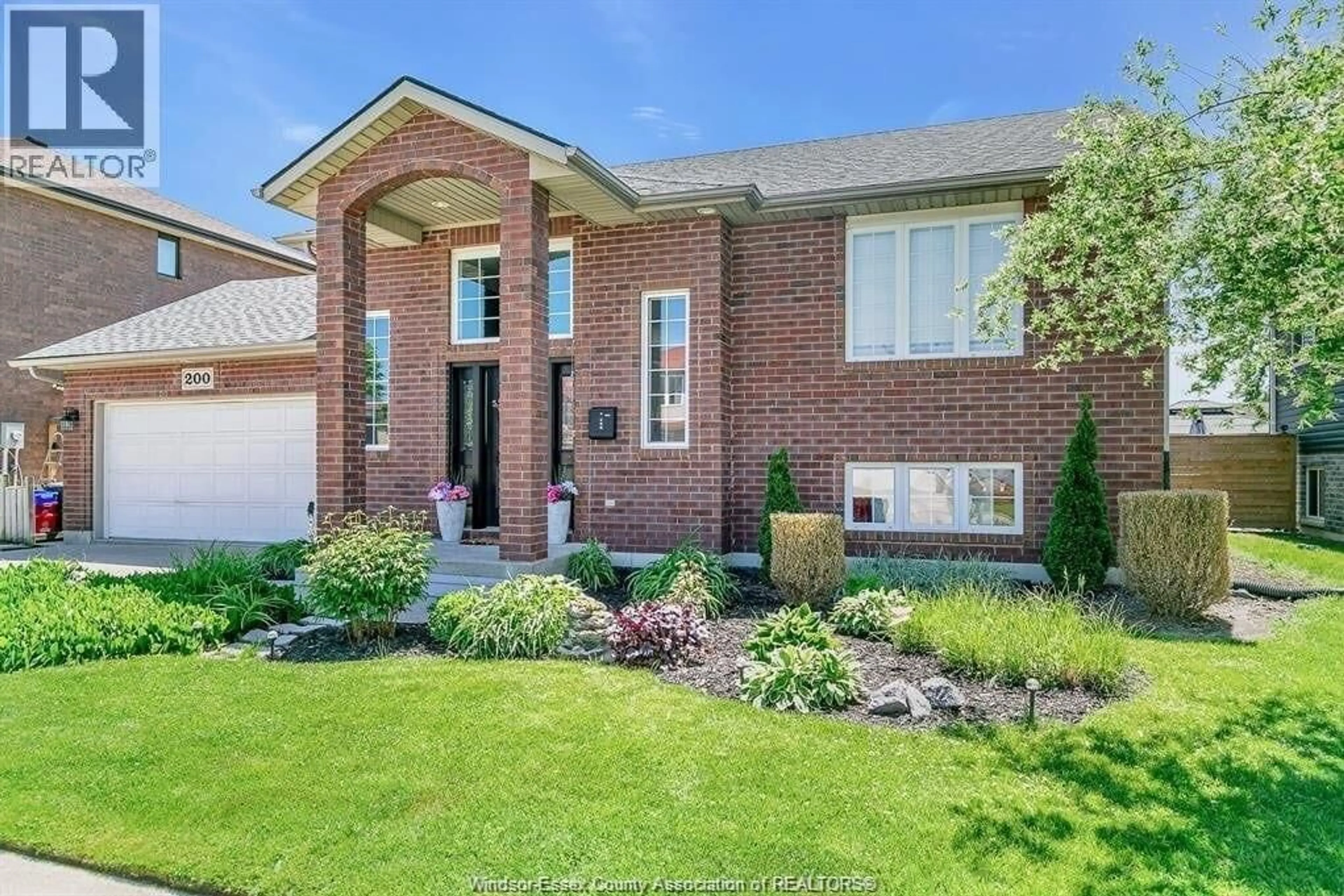 Home with brick exterior material, street for 200 RIVERVIEW Ave, LaSalle Ontario N9J 3Y1
