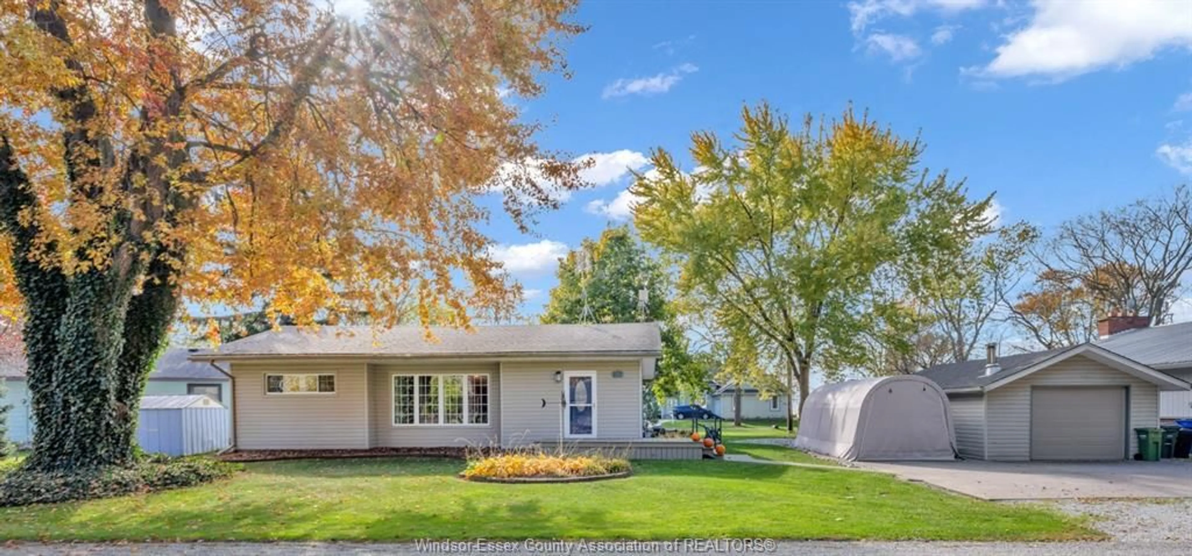 Home with vinyl exterior material, street for 105 MAPLE Lane, Harrow Ontario N0R 1G0