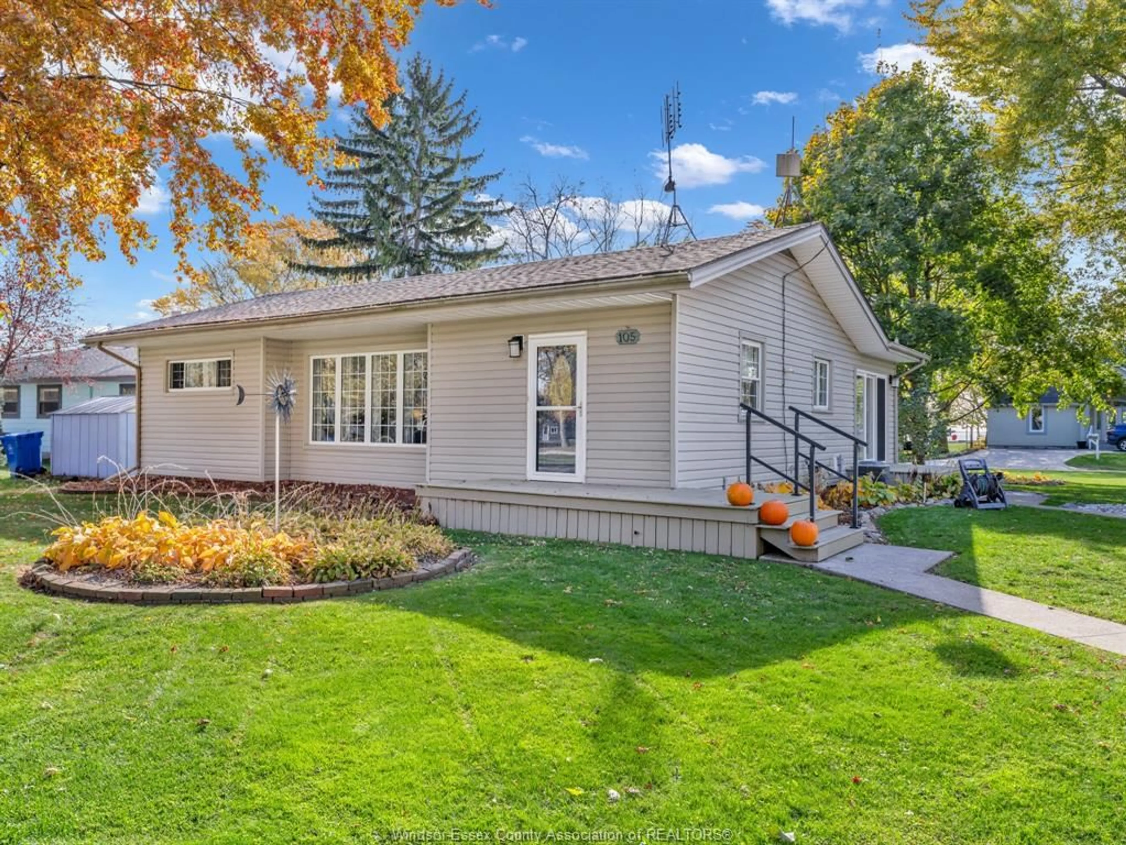 Home with vinyl exterior material, street for 105 MAPLE Lane, Harrow Ontario N0R 1G0