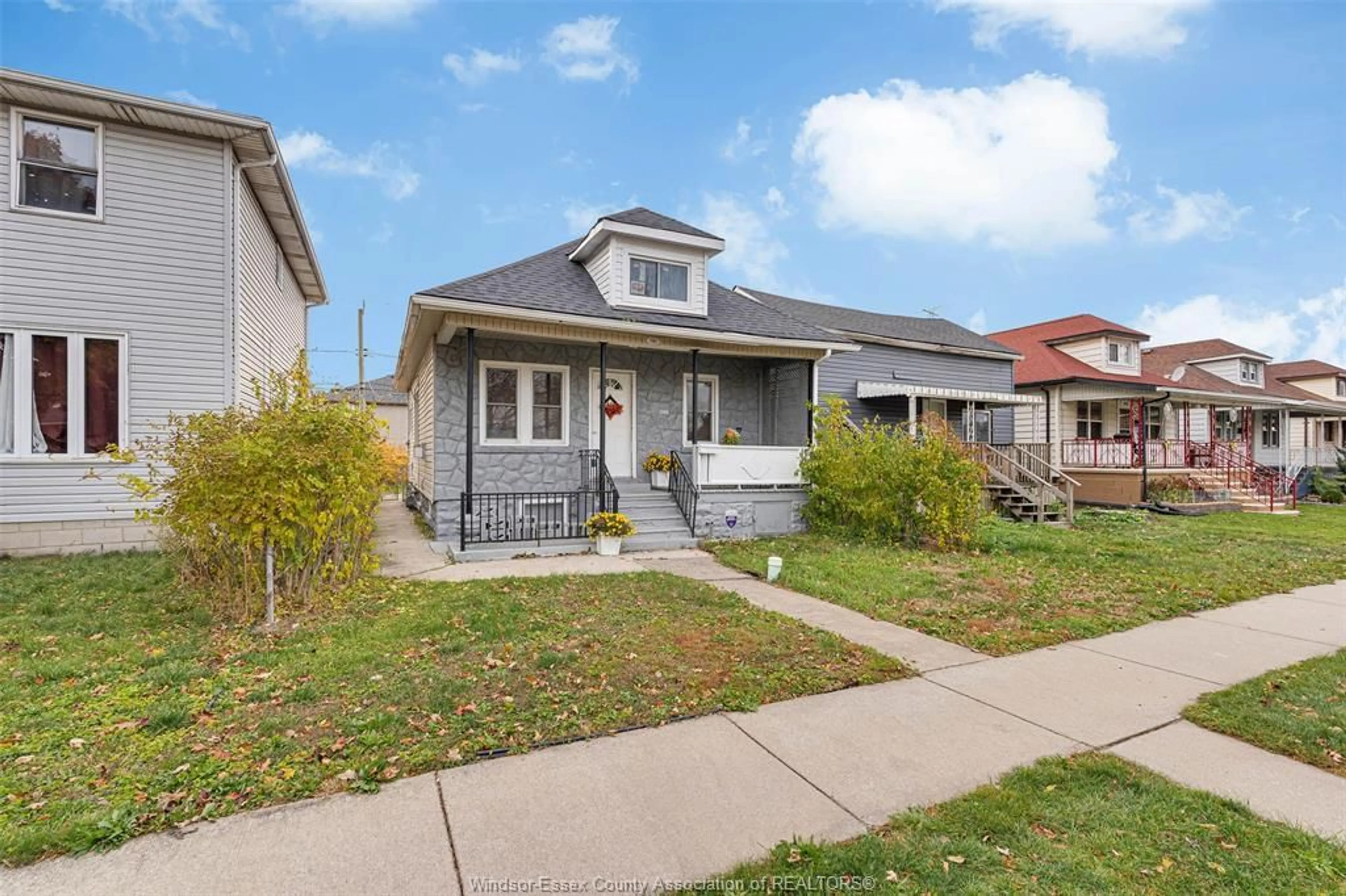 Home with vinyl exterior material, street for 1061 HIGHLAND Ave, Windsor Ontario N9A 1R6