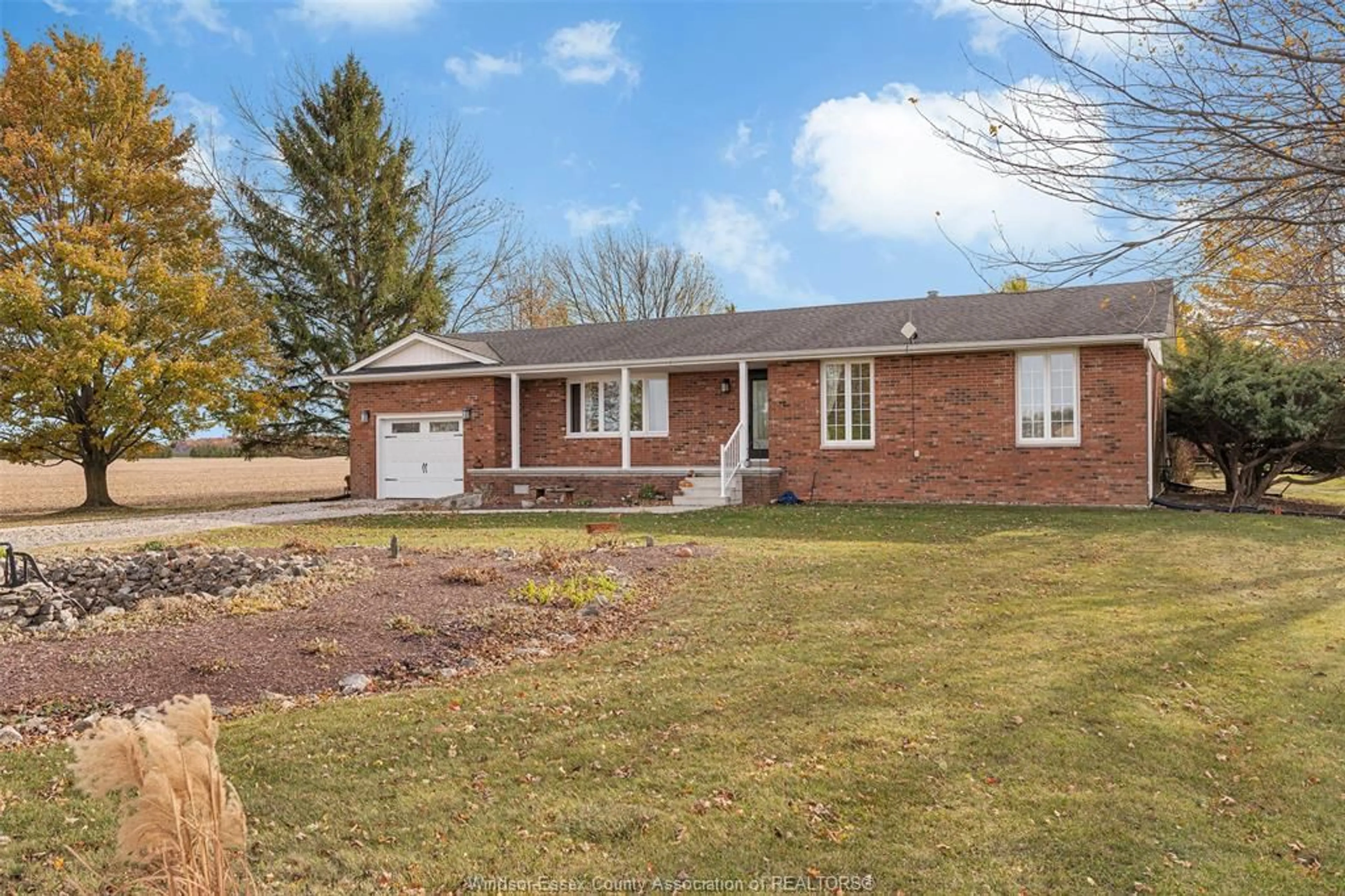 Home with brick exterior material, street for 527 COUNTY RD 42, Lakeshore Ontario N8N 2L9