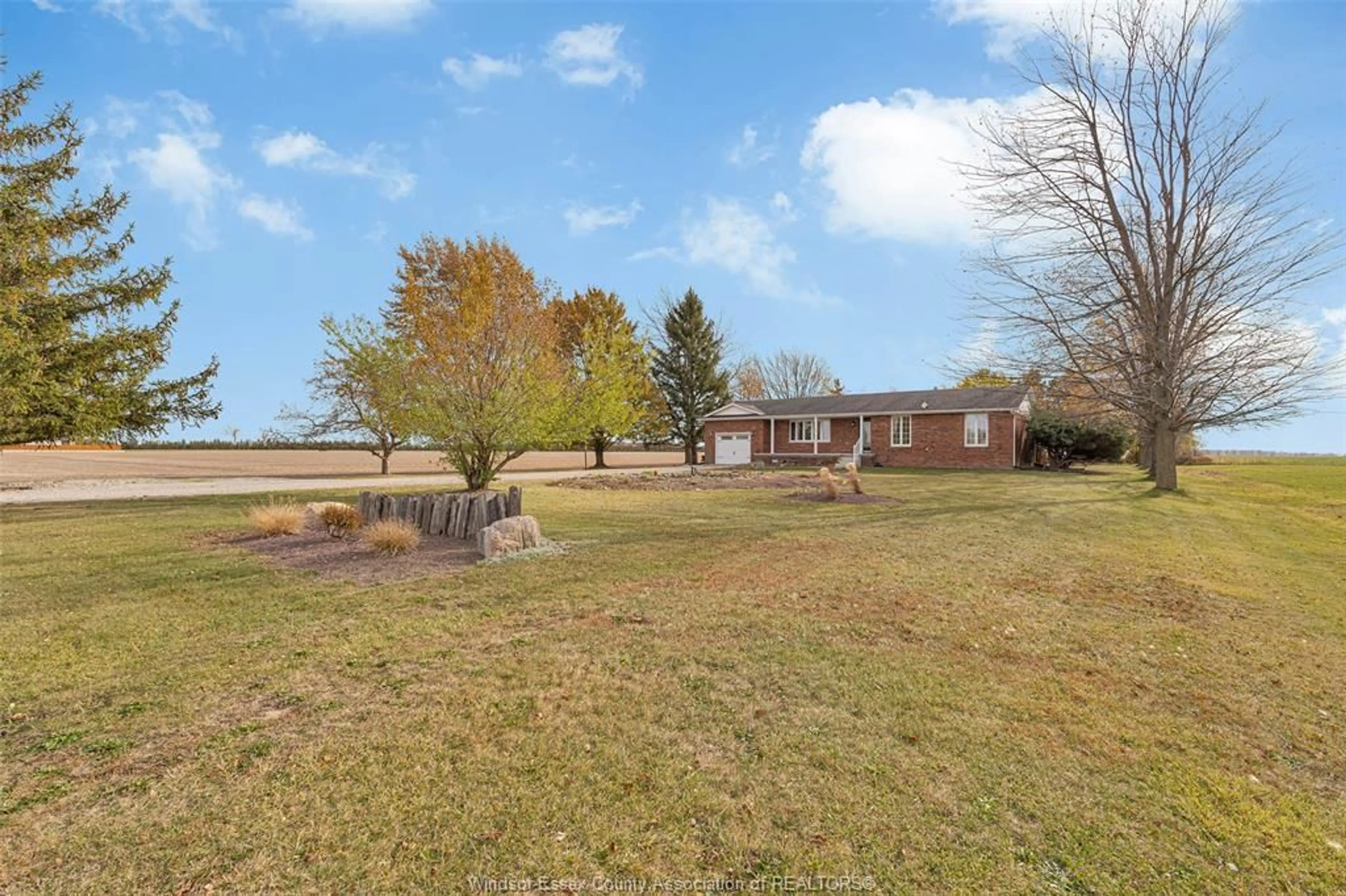 A pic from outside/outdoor area/front of a property/back of a property/a pic from drone, water/lake/river/ocean view for 527 COUNTY RD 42, Lakeshore Ontario N8N 2L9