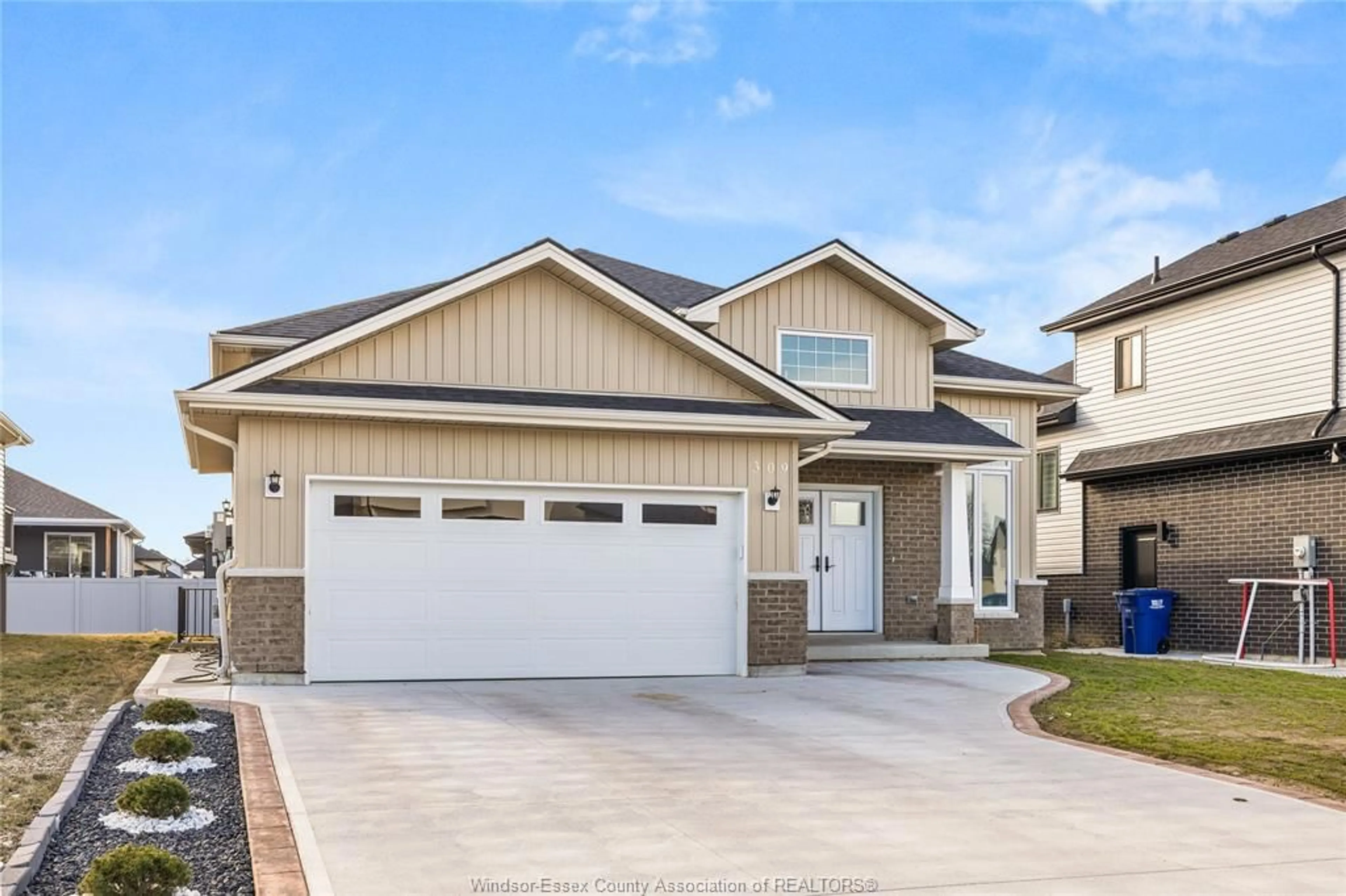 Home with vinyl exterior material, street for 309 MORIN Rd, Amherstburg Ontario N9V 0G8