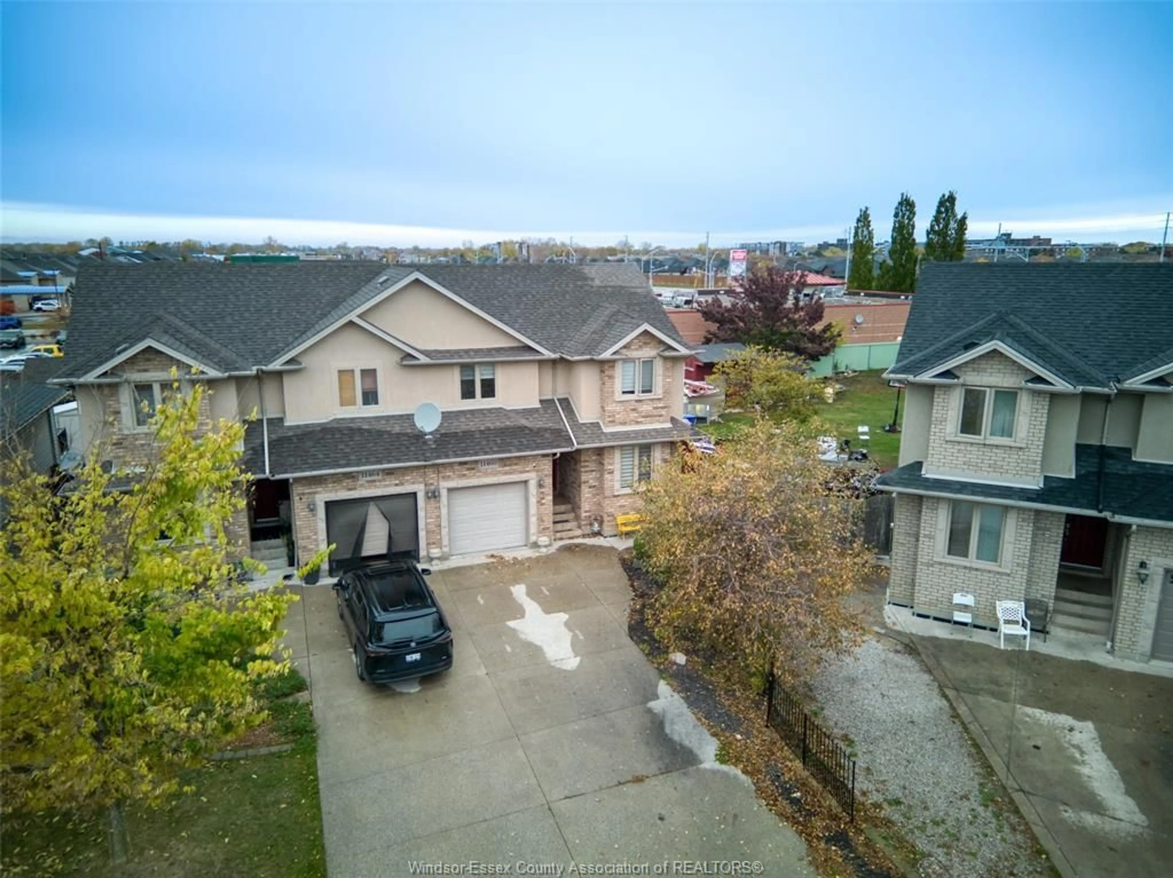 A pic from outside/outdoor area/front of a property/back of a property/a pic from drone, street for 11460 TIMBER BAY Cres, Windsor Ontario N8R 2K9