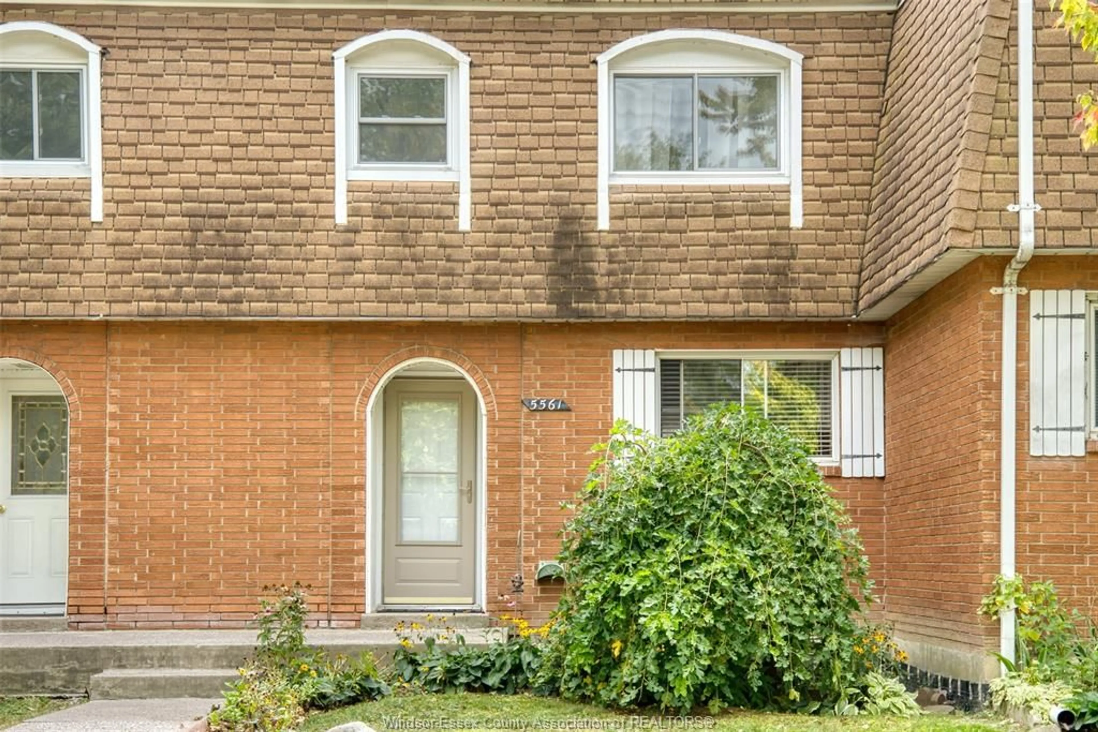 Home with brick exterior material, street for 5561 EMPRESS #58, Windsor Ontario N8T 3B2