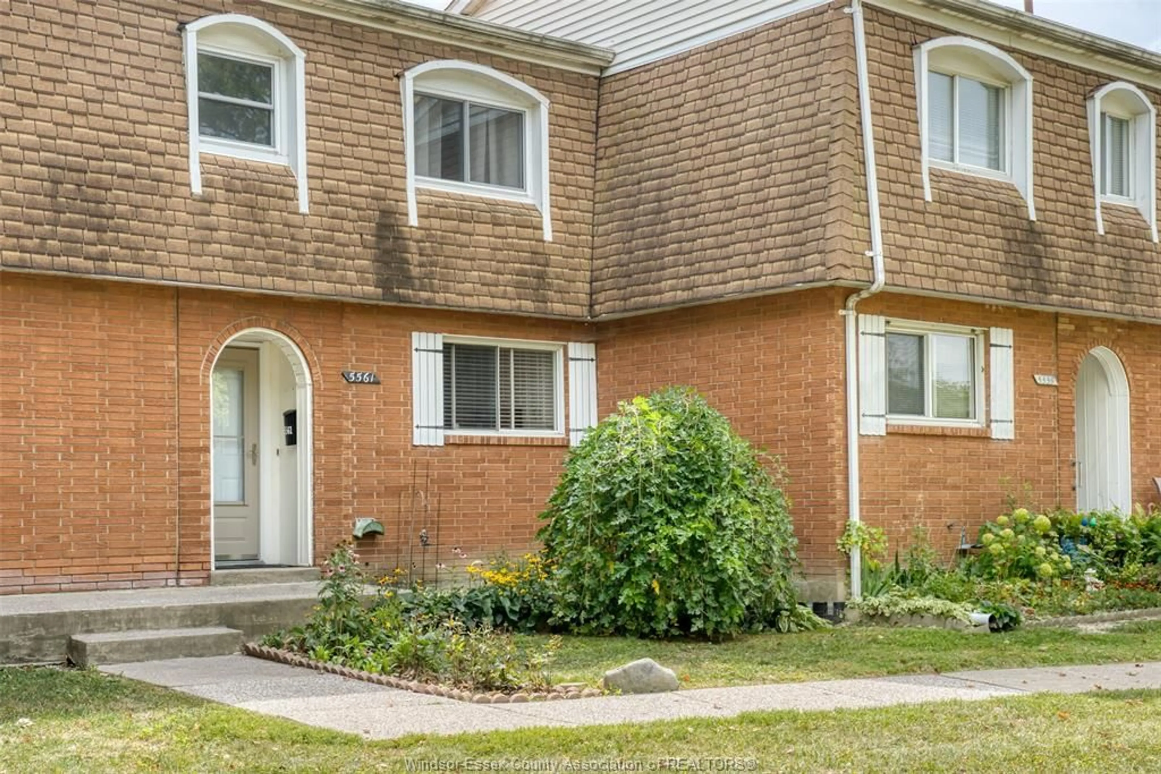 Home with brick exterior material, street for 5561 EMPRESS #58, Windsor Ontario N8T 3B2