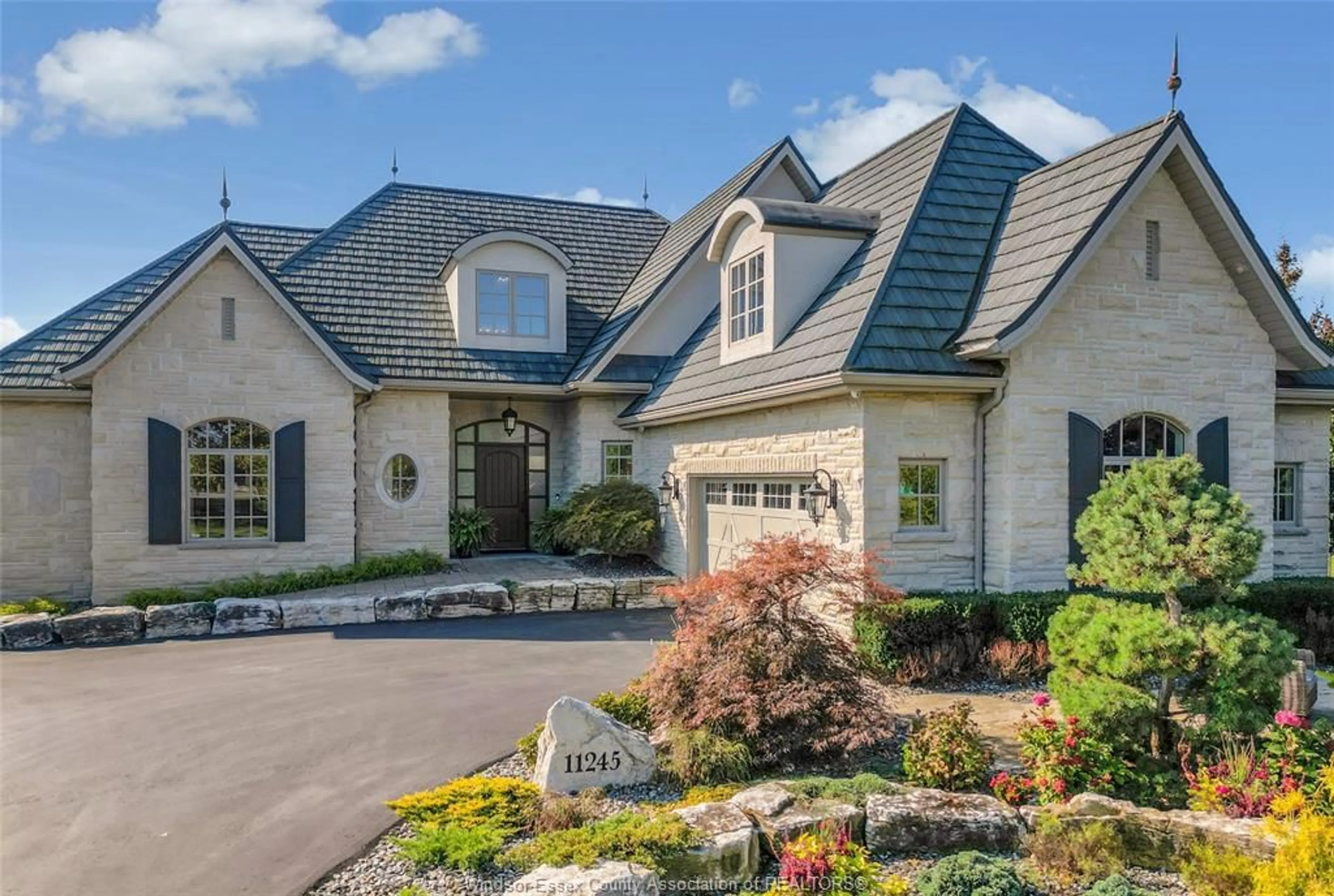 Home with brick exterior material, unknown for 11245 RIVERSIDE Dr, Windsor Ontario N8P 1A5