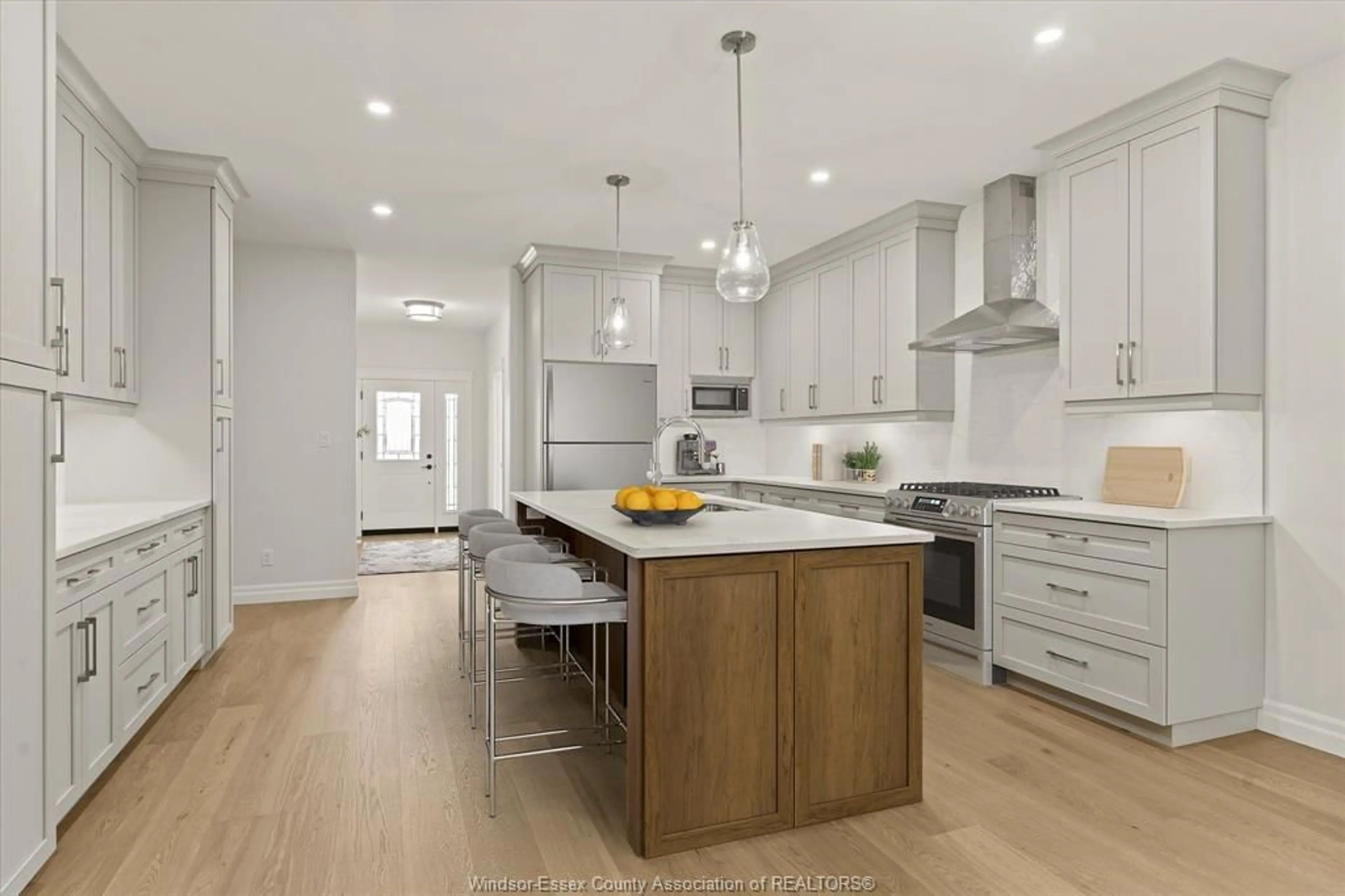 Open concept kitchen, wood/laminate floor for 3255 TULLIO Dr, LaSalle Ontario N9H 1H3