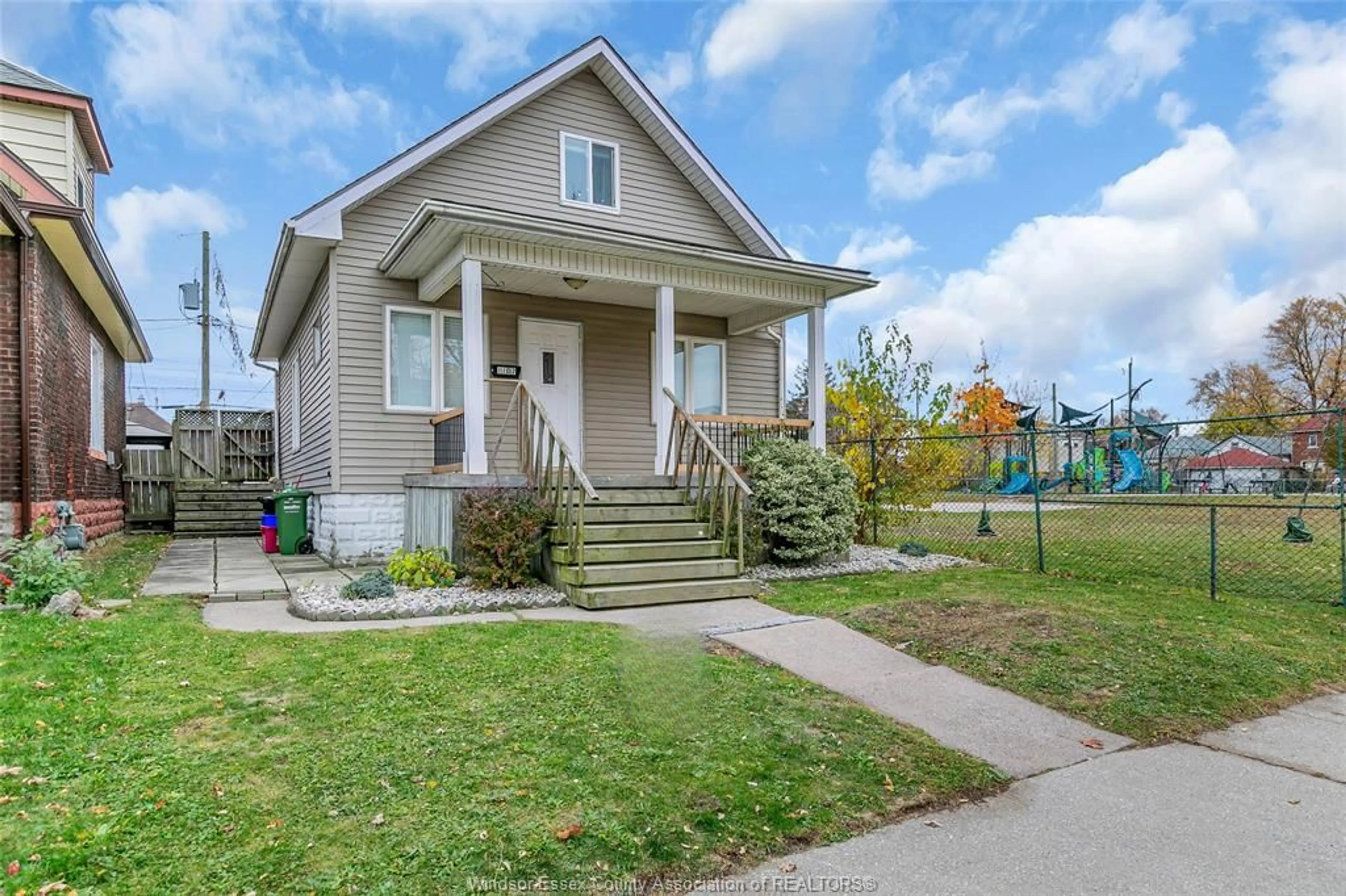 Home with vinyl exterior material, street for 1107 UNIVERSITY Ave, Windsor Ontario N9A 3A5