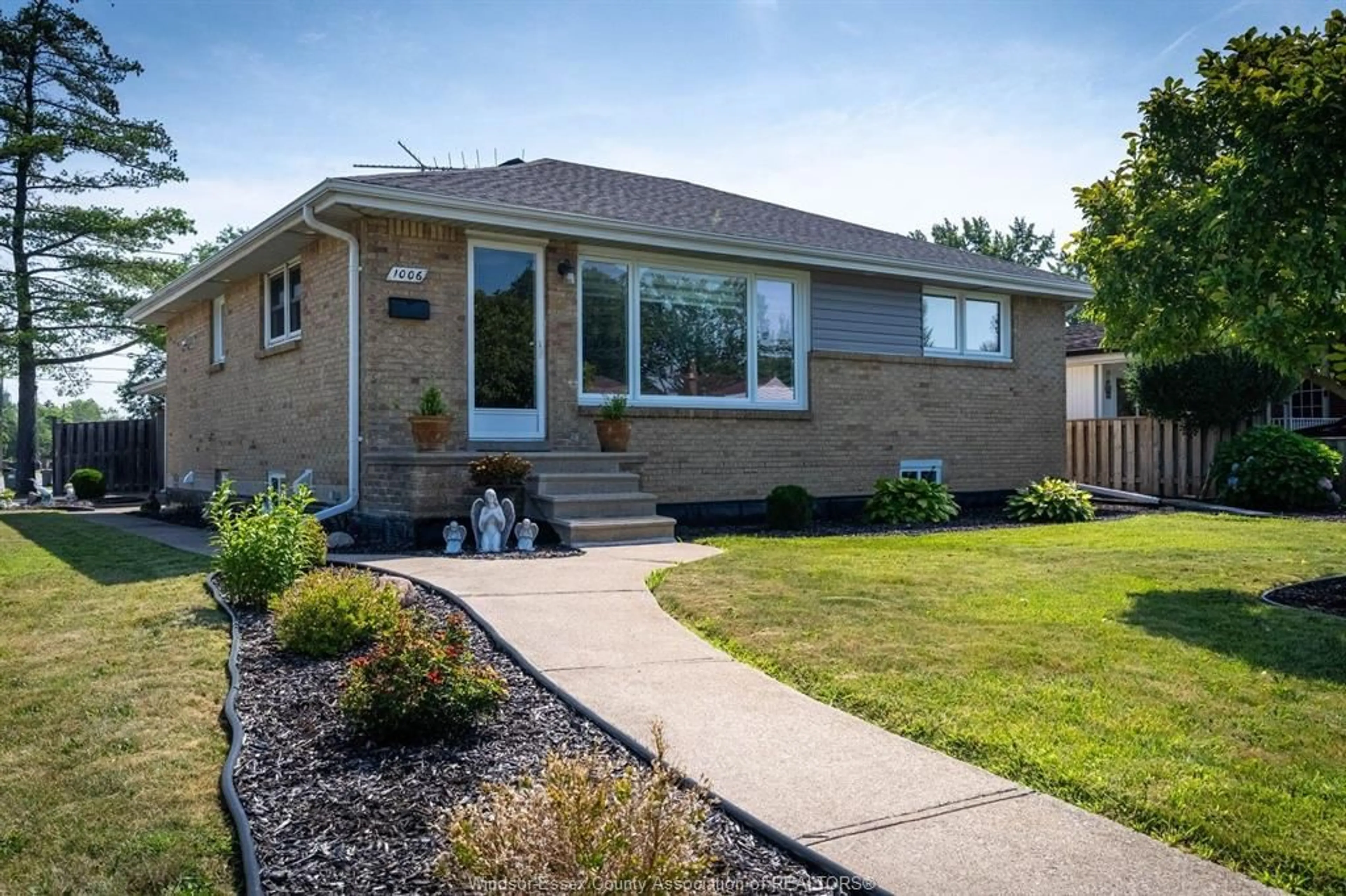 Home with brick exterior material, street for 1006 BUCKINGHAM Rd, Windsor Ontario N8S 2E3