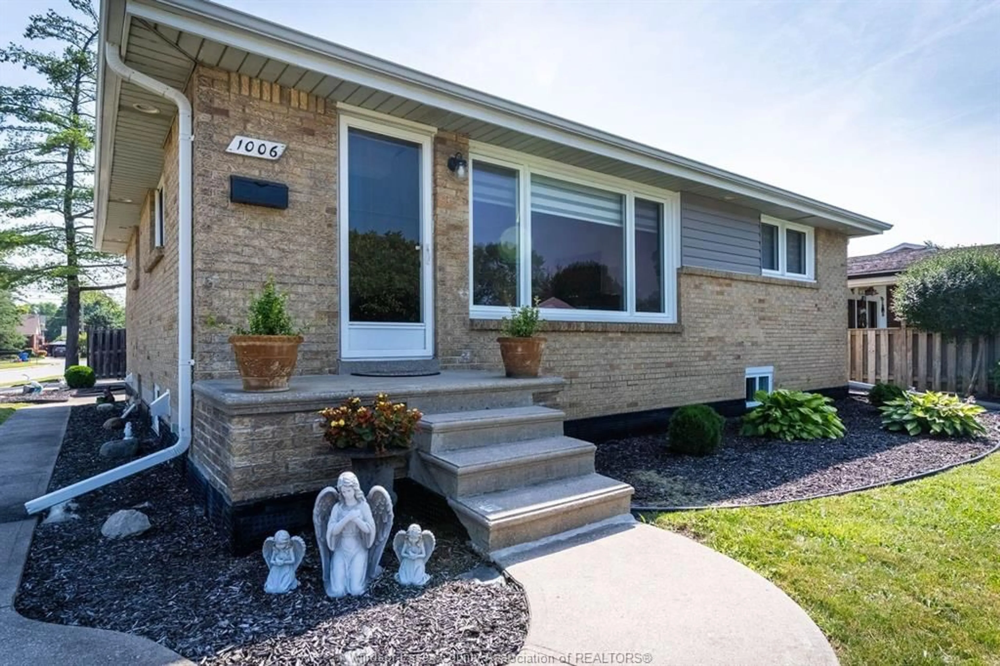 Home with brick exterior material, street for 1006 BUCKINGHAM Rd, Windsor Ontario N8S 2E3
