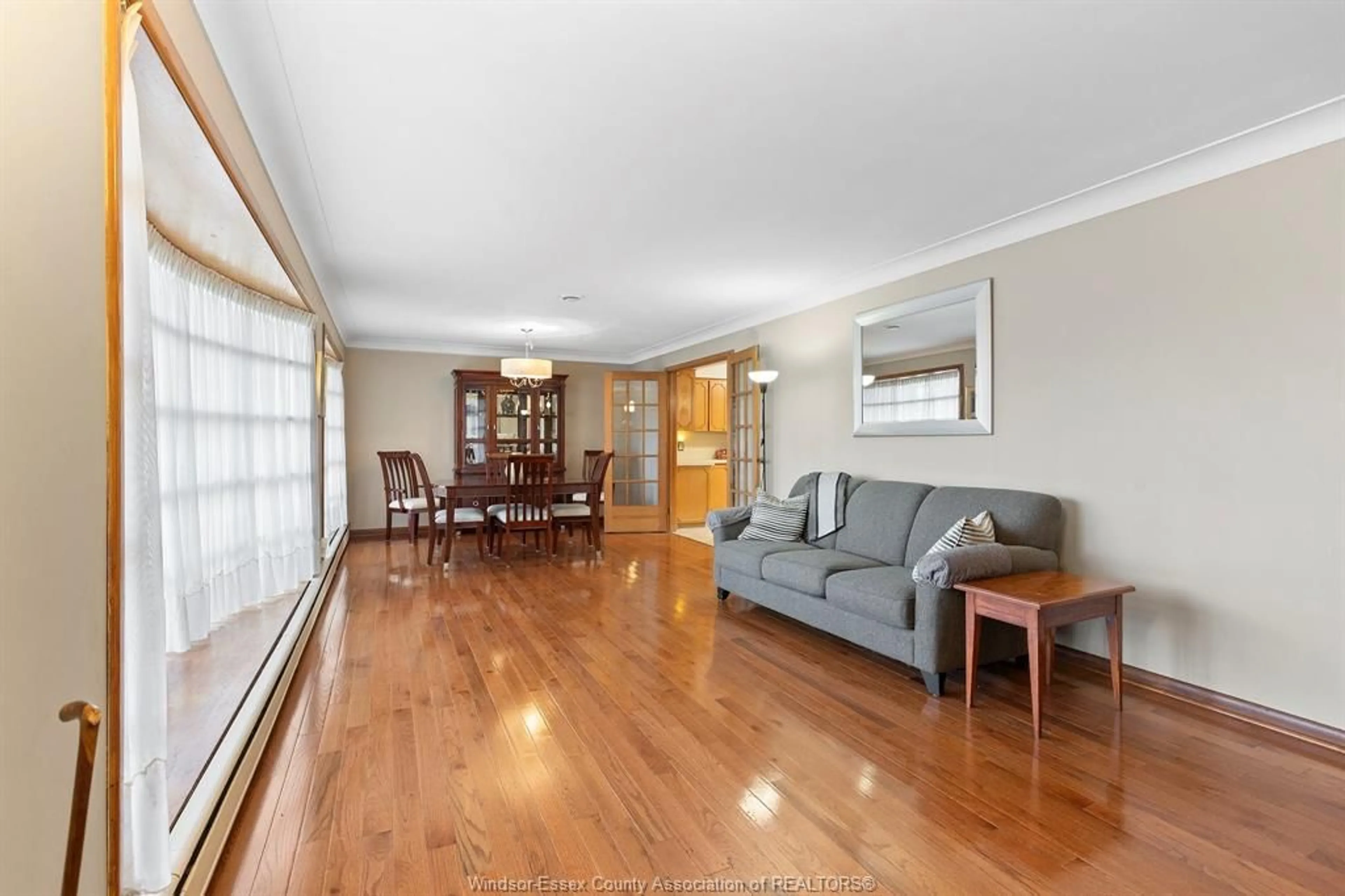 Living room with furniture, wood/laminate floor for 2797 WESTMINSTER, Windsor Ontario N8T 1Y6