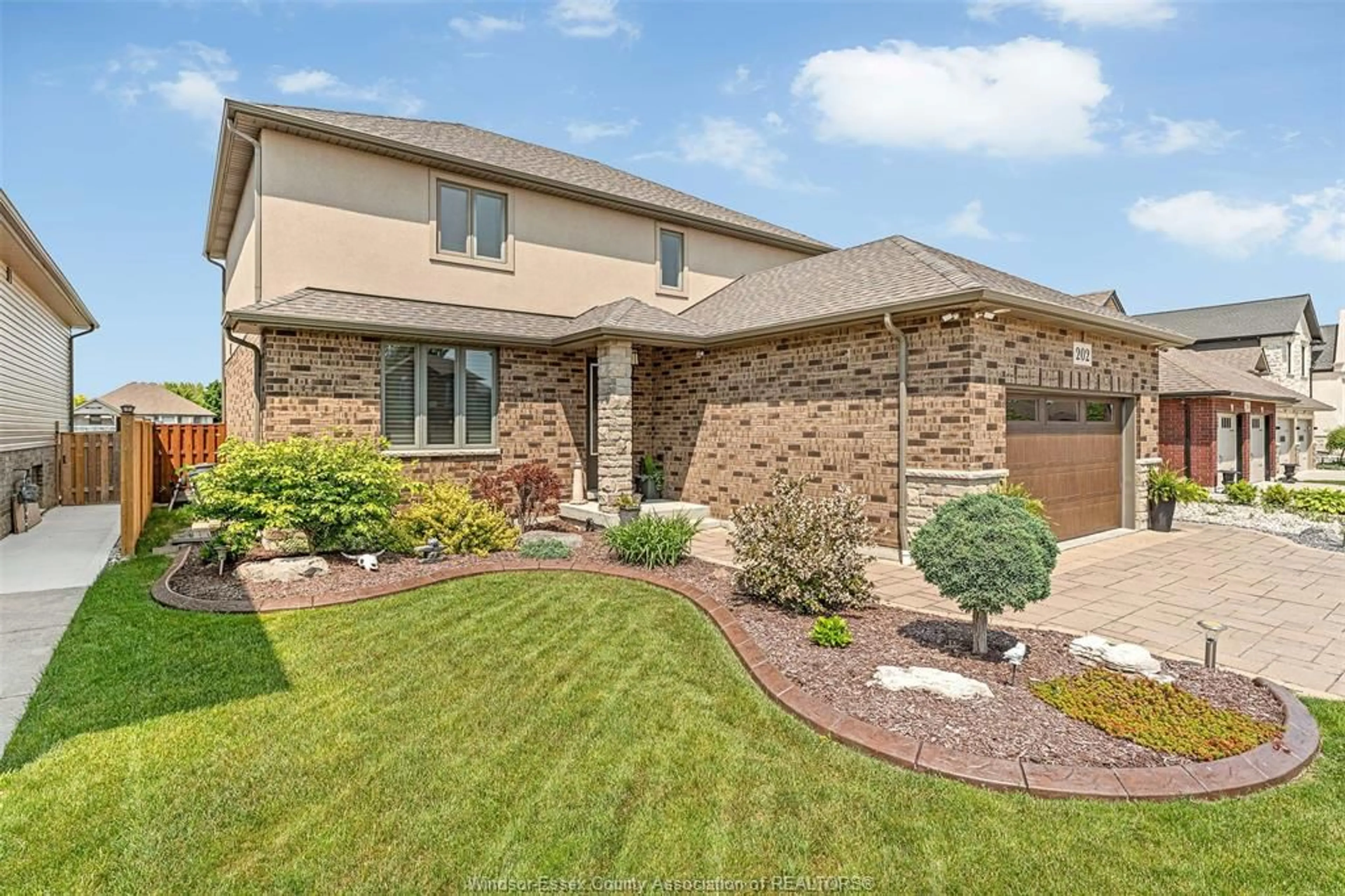 Home with brick exterior material, street for 202 SUMMER St, Lakeshore Ontario N8L 0G6