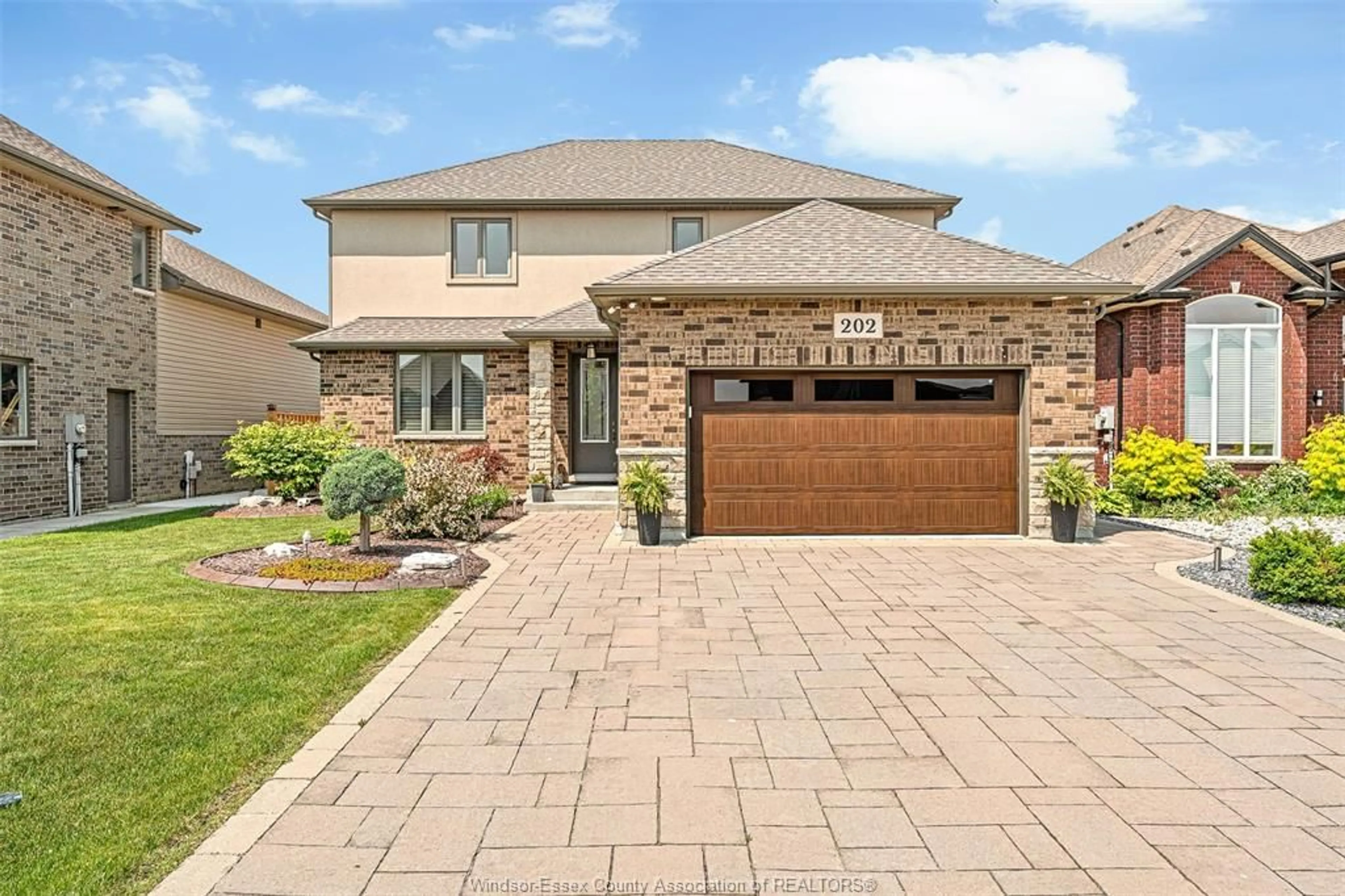 Home with brick exterior material, street for 202 SUMMER St, Lakeshore Ontario N8L 0G6