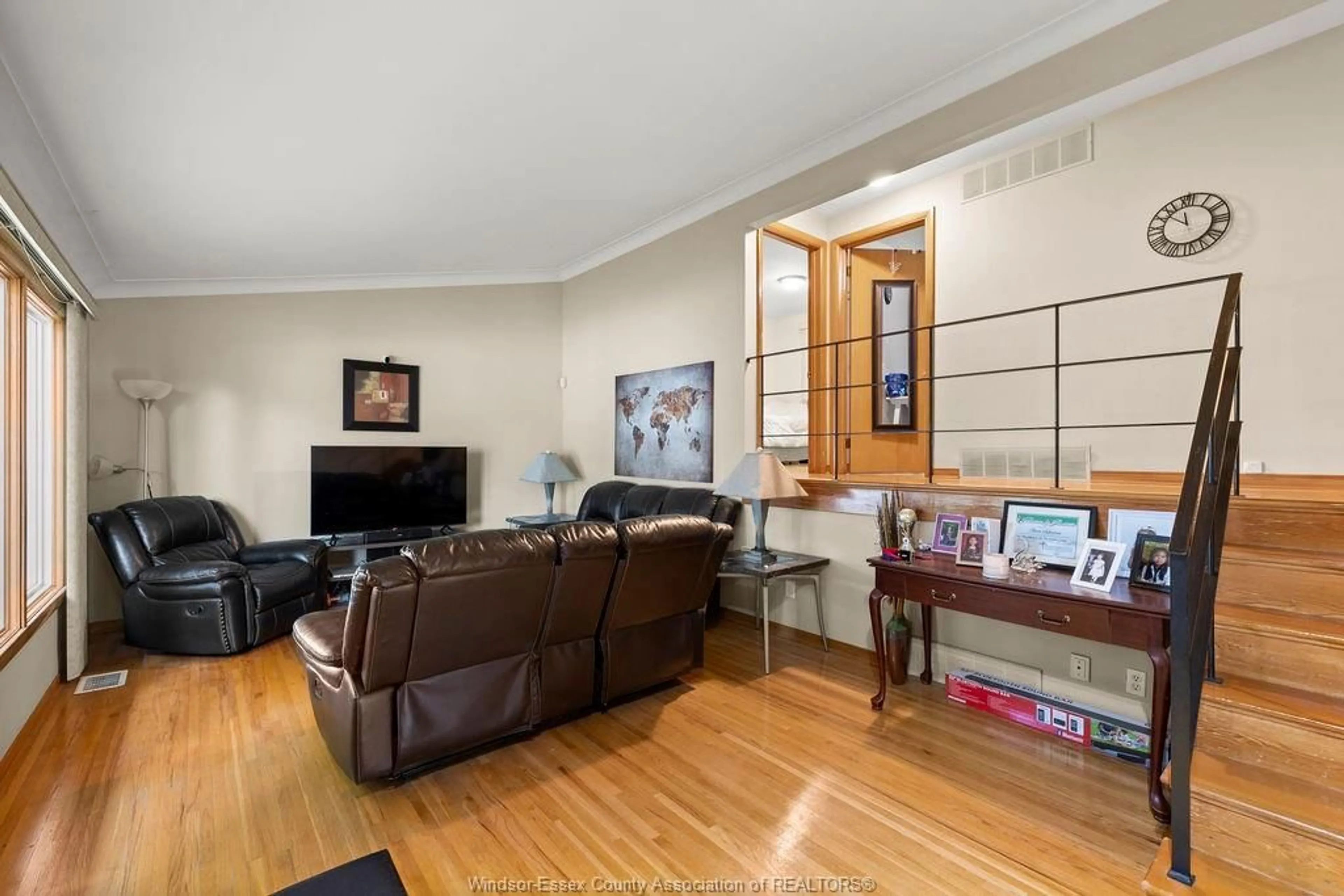 Living room with furniture, wood/laminate floor for 2584 GAIL, Windsor Ontario N8W 2Z6