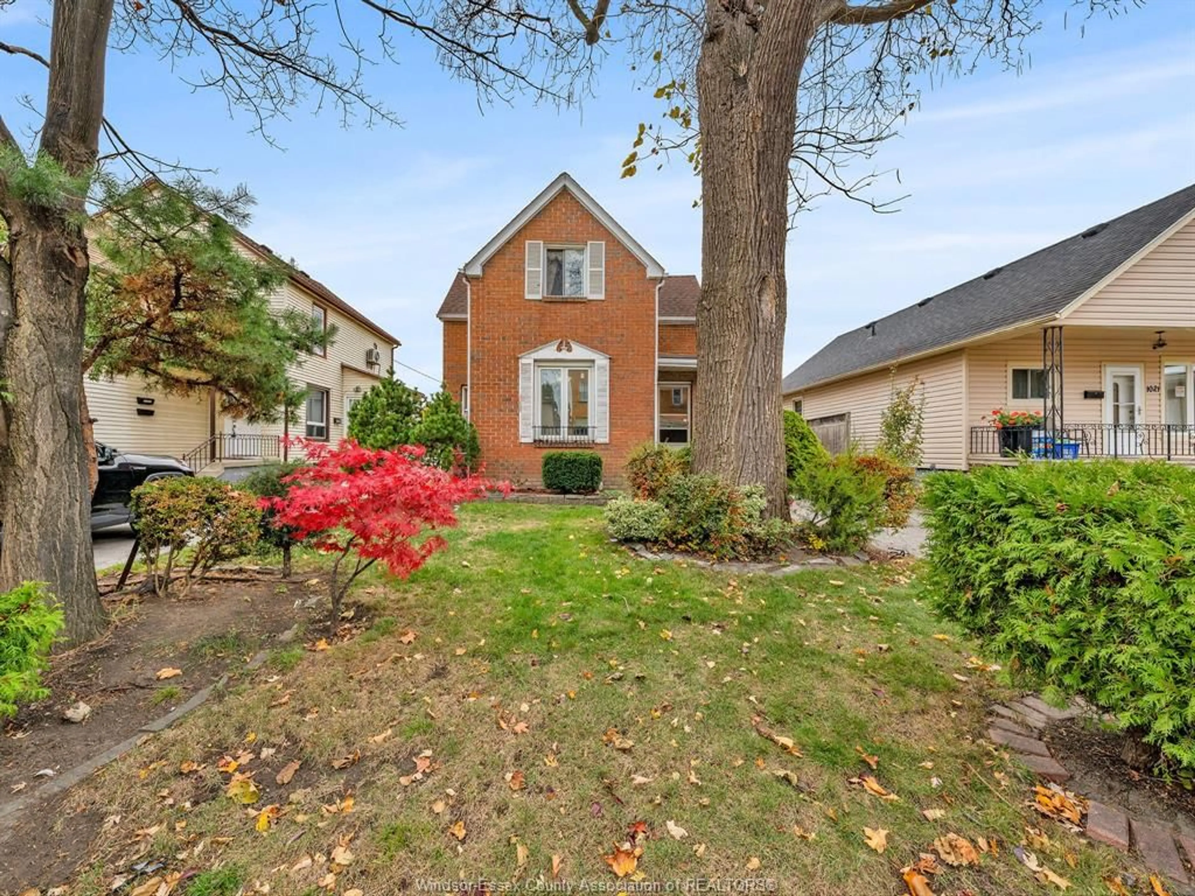 A pic from outside/outdoor area/front of a property/back of a property/a pic from drone, street for 1025 LANGLOIS Ave, Windsor Ontario N9A 2H4