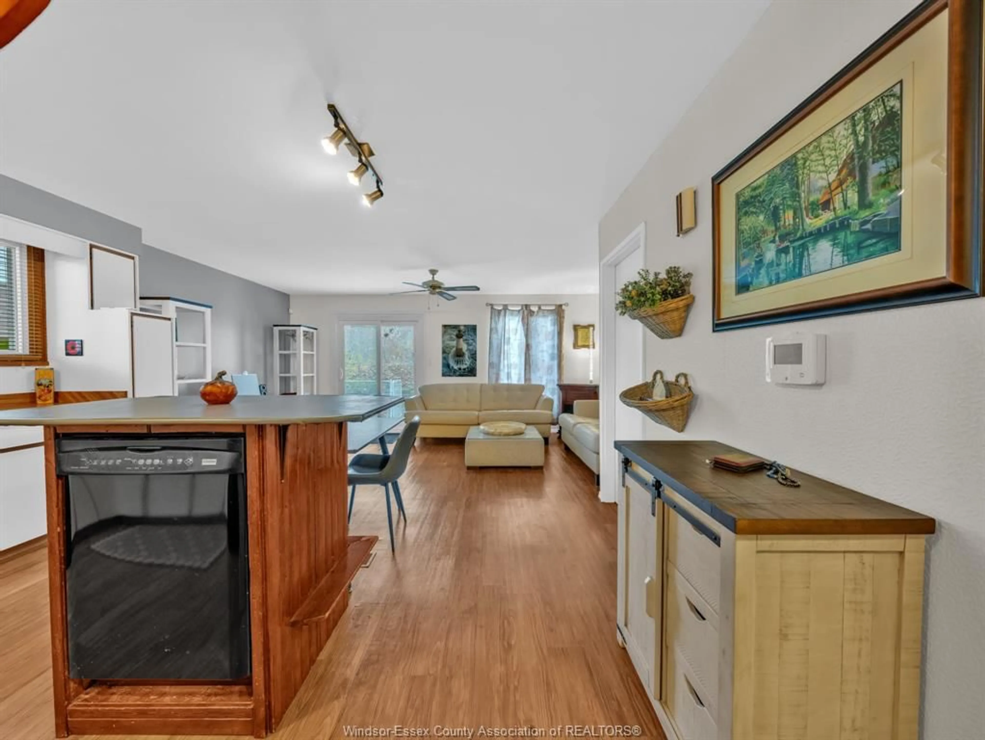 Open concept kitchen, wood/laminate floor for 1246 AIRE Pl, Windsor Ontario N8S 4E4