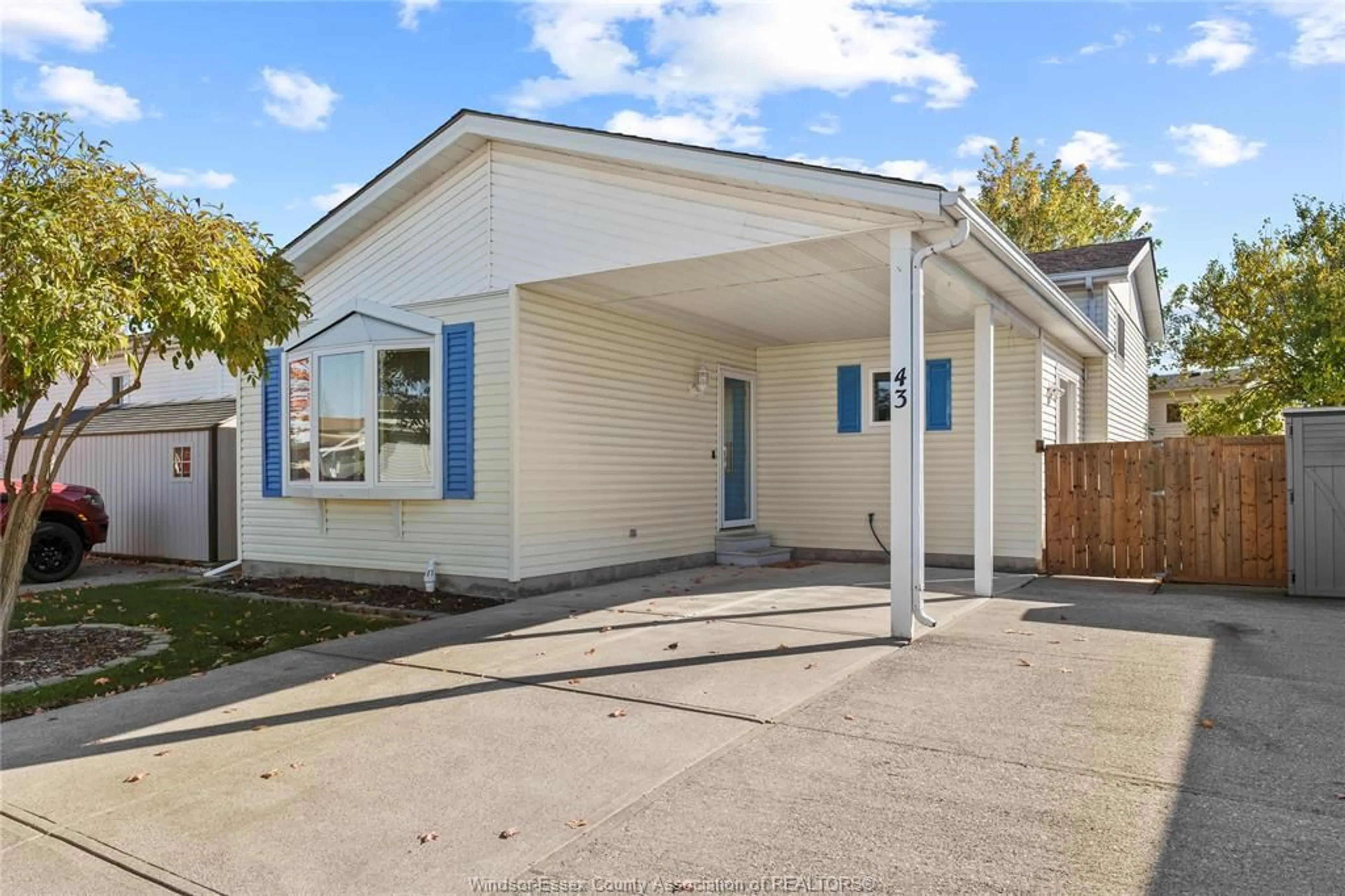 Home with vinyl exterior material, street for 43 CHERRY St, McGregor Ontario N0R 1J0