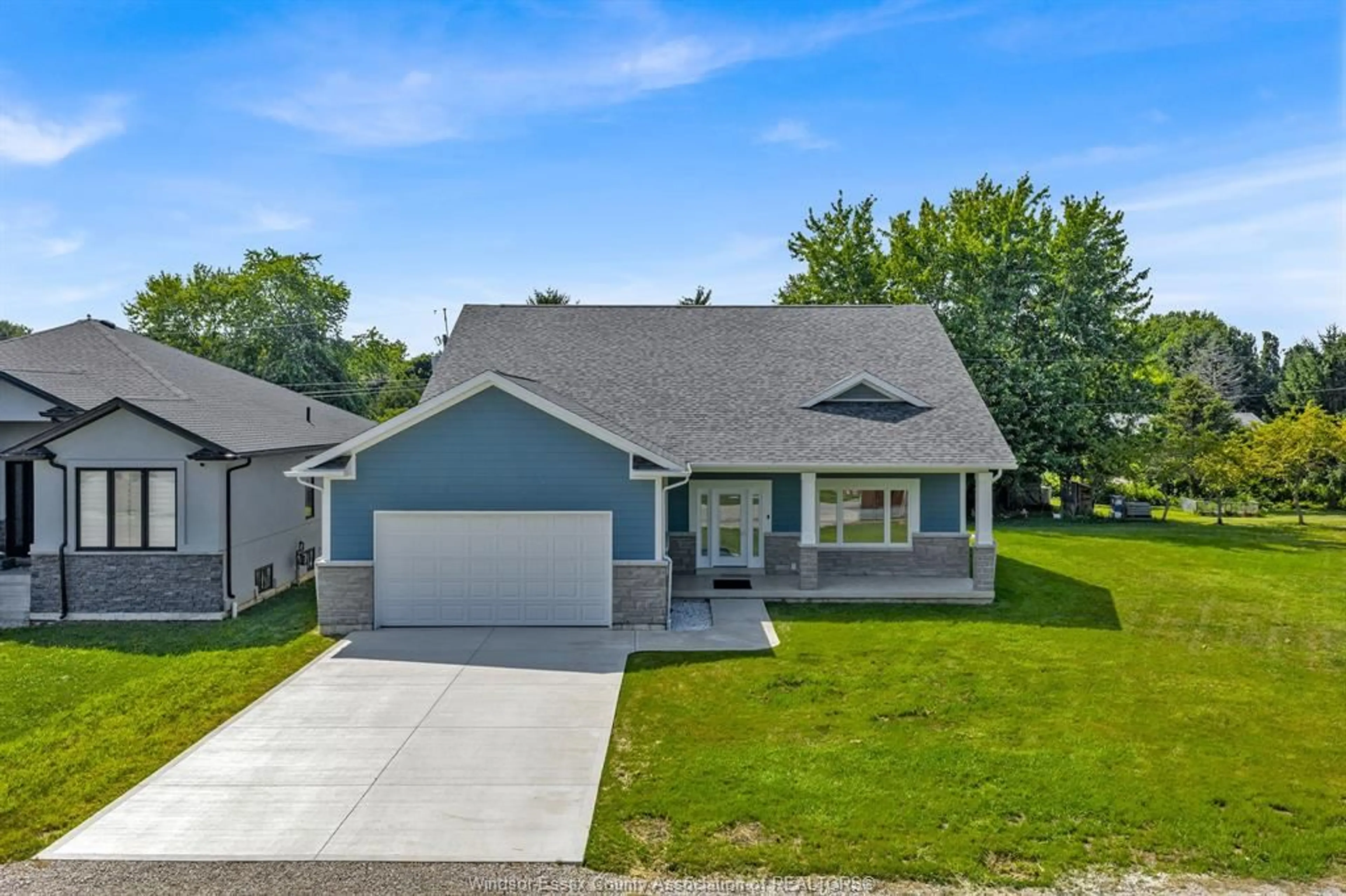 A pic from outside/outdoor area/front of a property/back of a property/a pic from drone, street for 157 GLOUCESTER Dr, Essex Ontario N0R 1G0