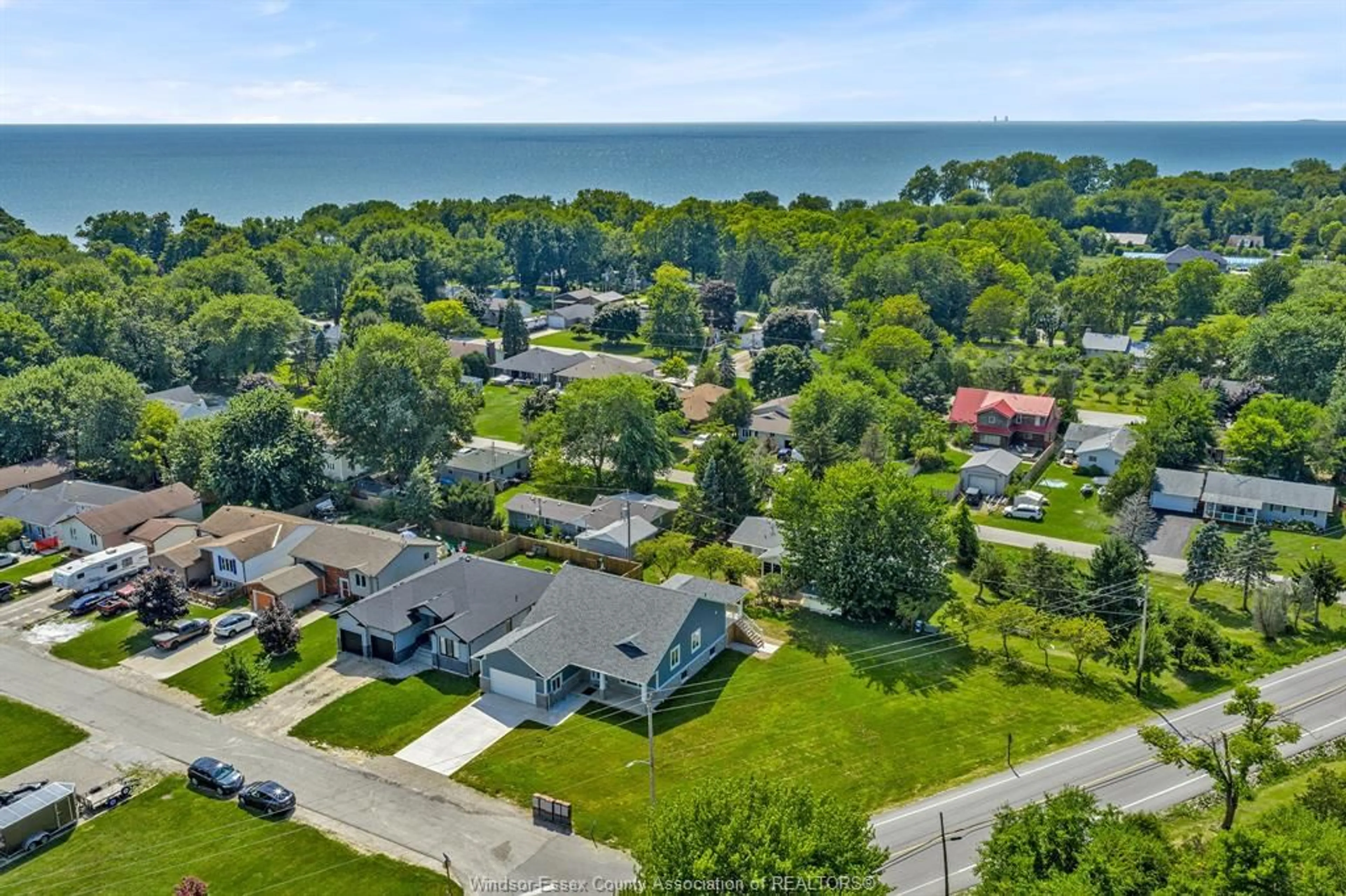 A pic from outside/outdoor area/front of a property/back of a property/a pic from drone, water/lake/river/ocean view for 157 GLOUCESTER Dr, Essex Ontario N0R 1G0