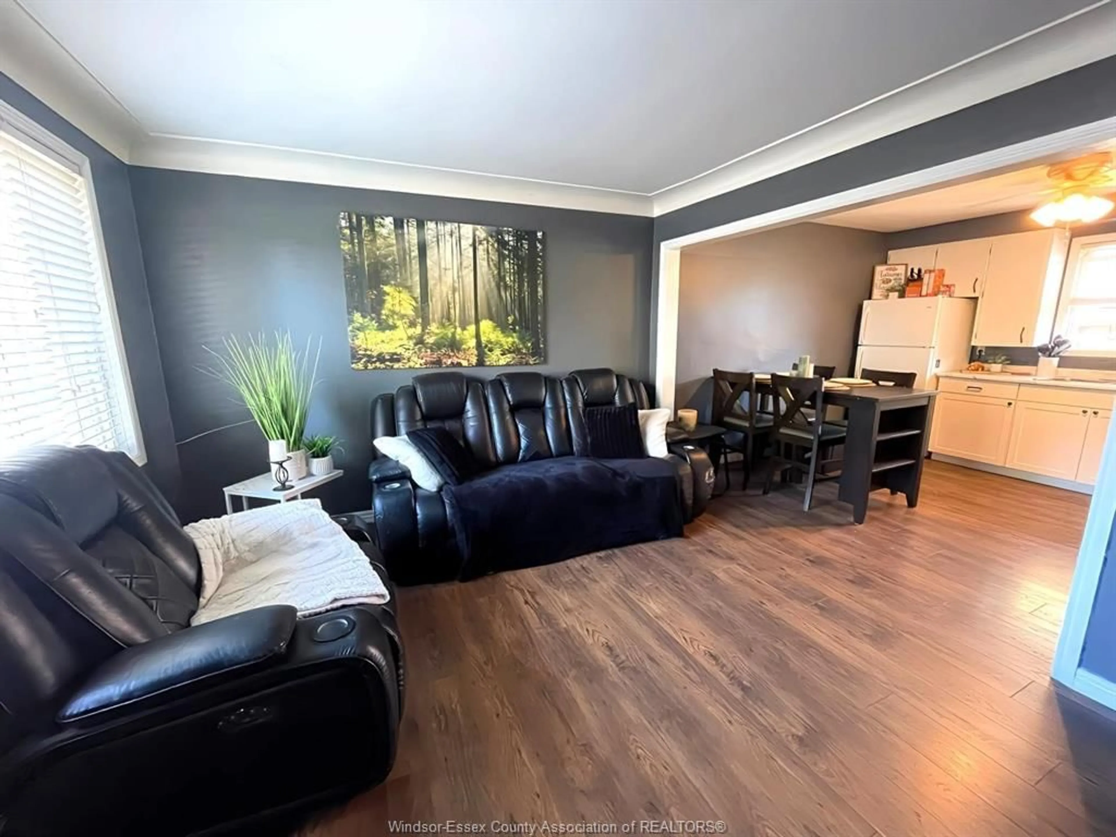 Living room with furniture, wood/laminate floor for 2980 CLEMENCEAU, Windsor Ontario N8T 2R1