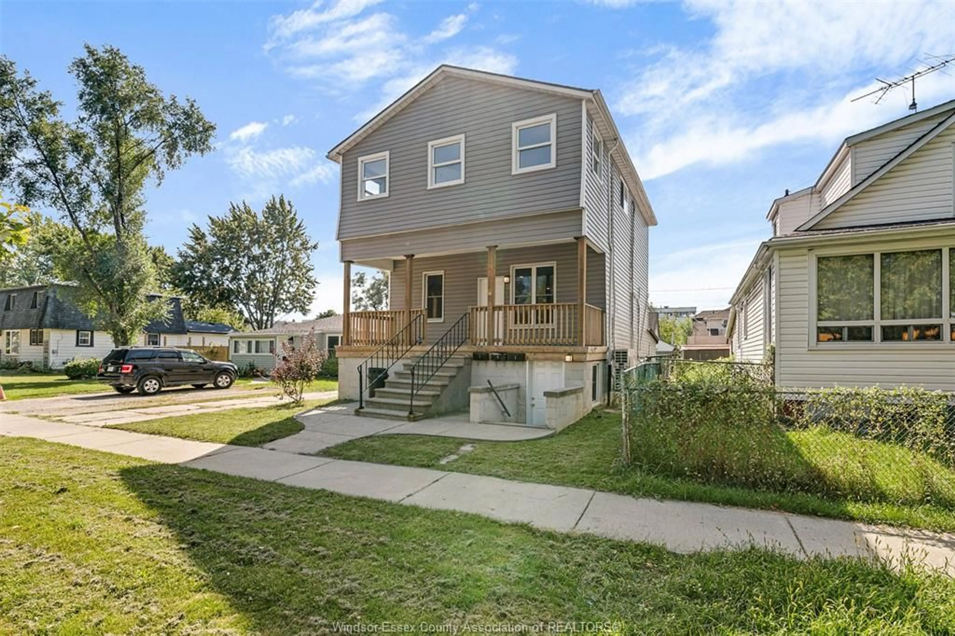 Home with vinyl exterior material, street for 2409 ALEXIS, Windsor Ontario N9A 3J6