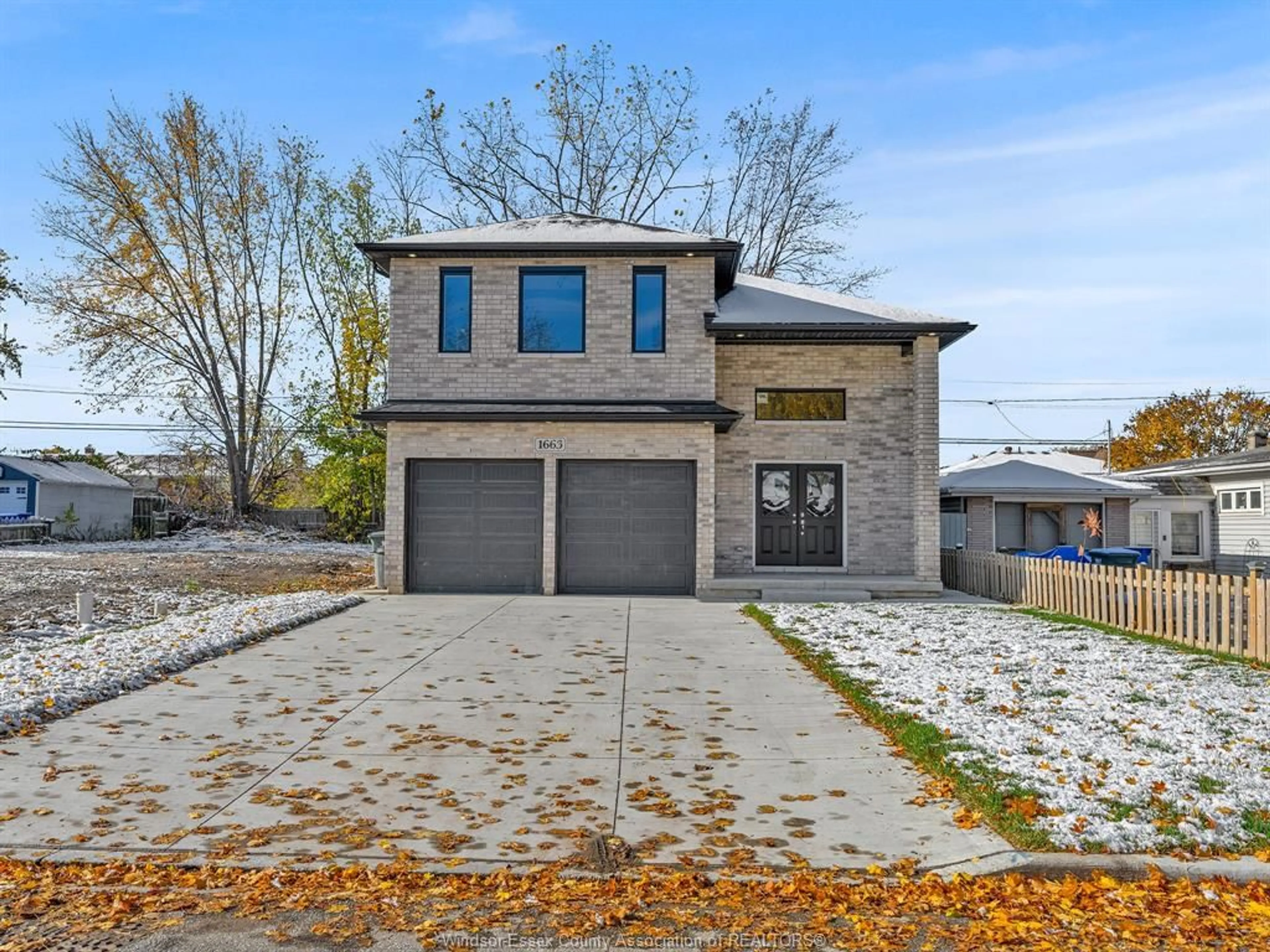 Home with brick exterior material, street for 1663 BETTS Ave, Windsor Ontario N9B 3L4
