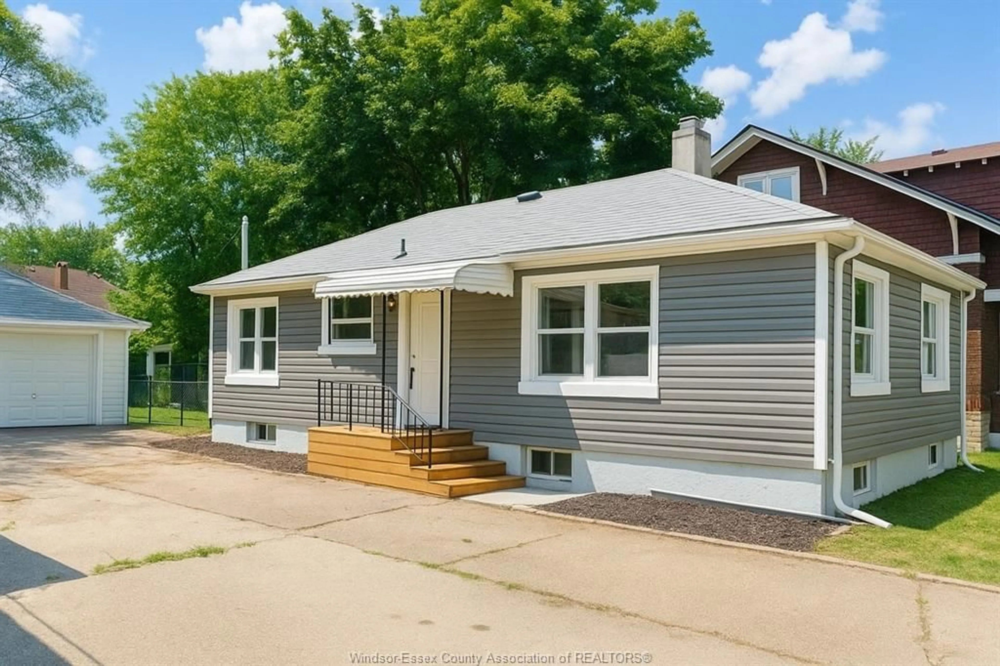 Home with vinyl exterior material, street for 473 INDIAN Rd, Windsor Ontario N9C 2M3