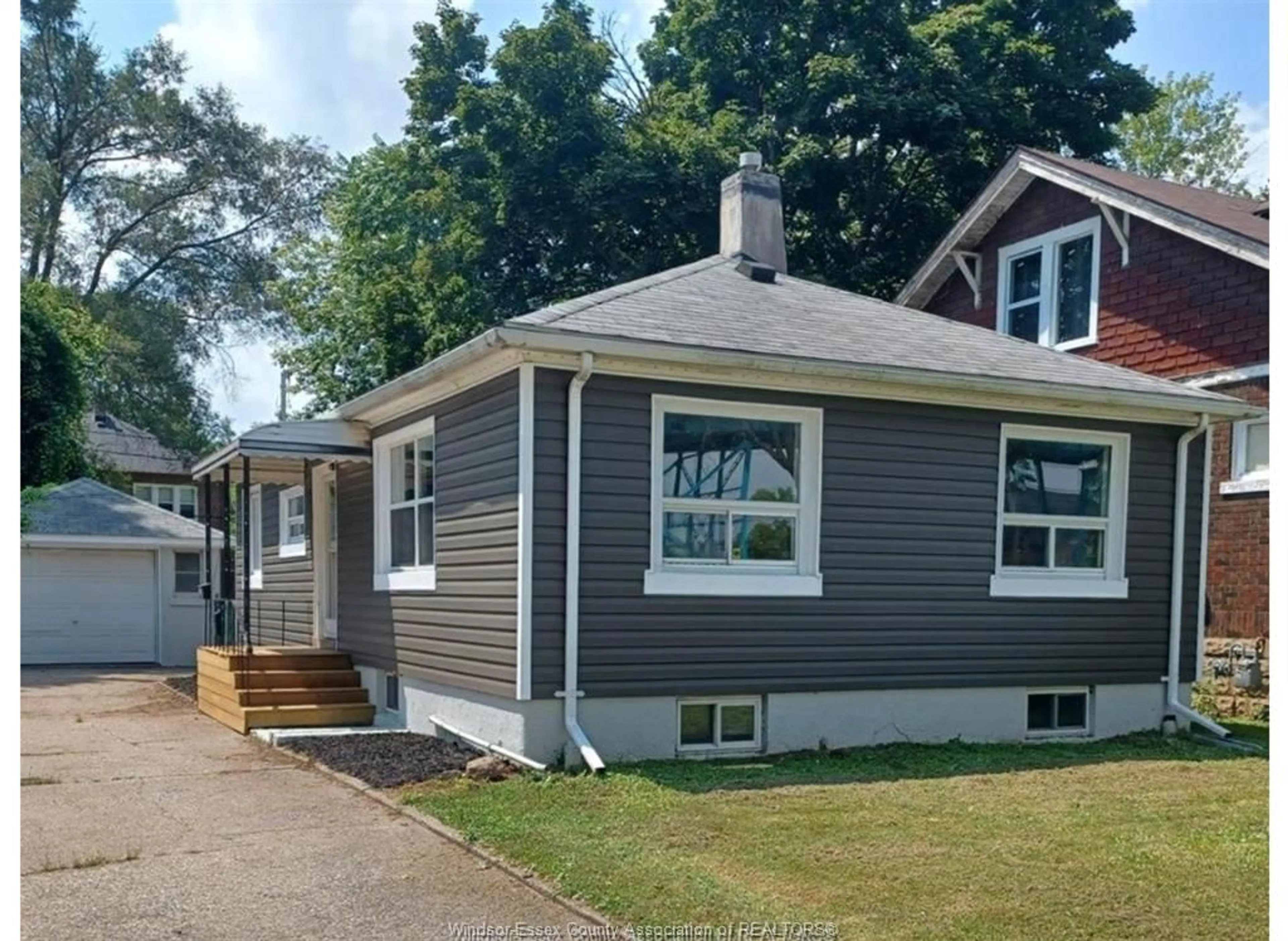 Home with vinyl exterior material, street for 473 INDIAN Rd, Windsor Ontario N9C 2M3