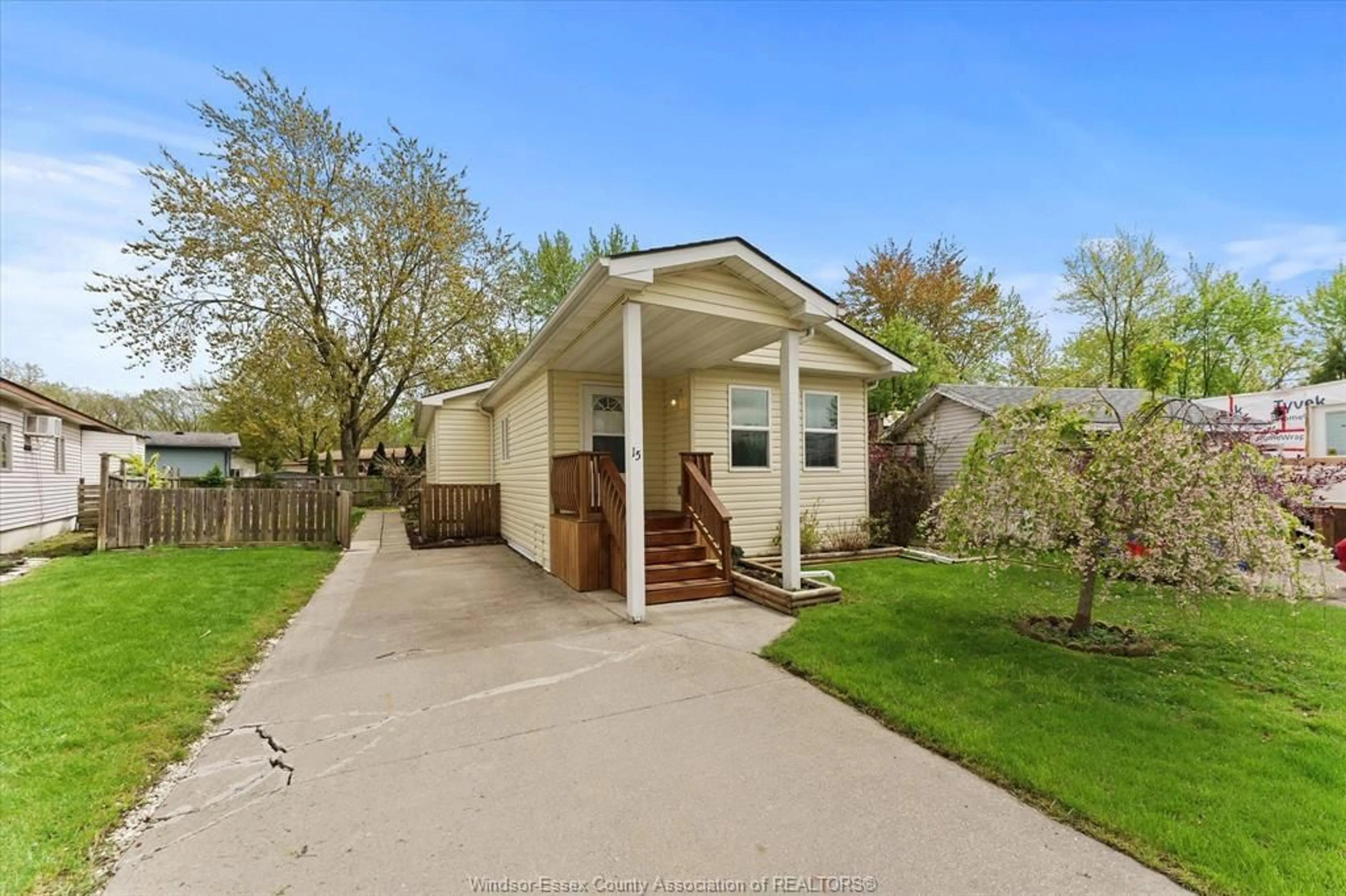 Home with vinyl exterior material, street for 15 SPRUCE St, McGregor Ontario N0R 1J0