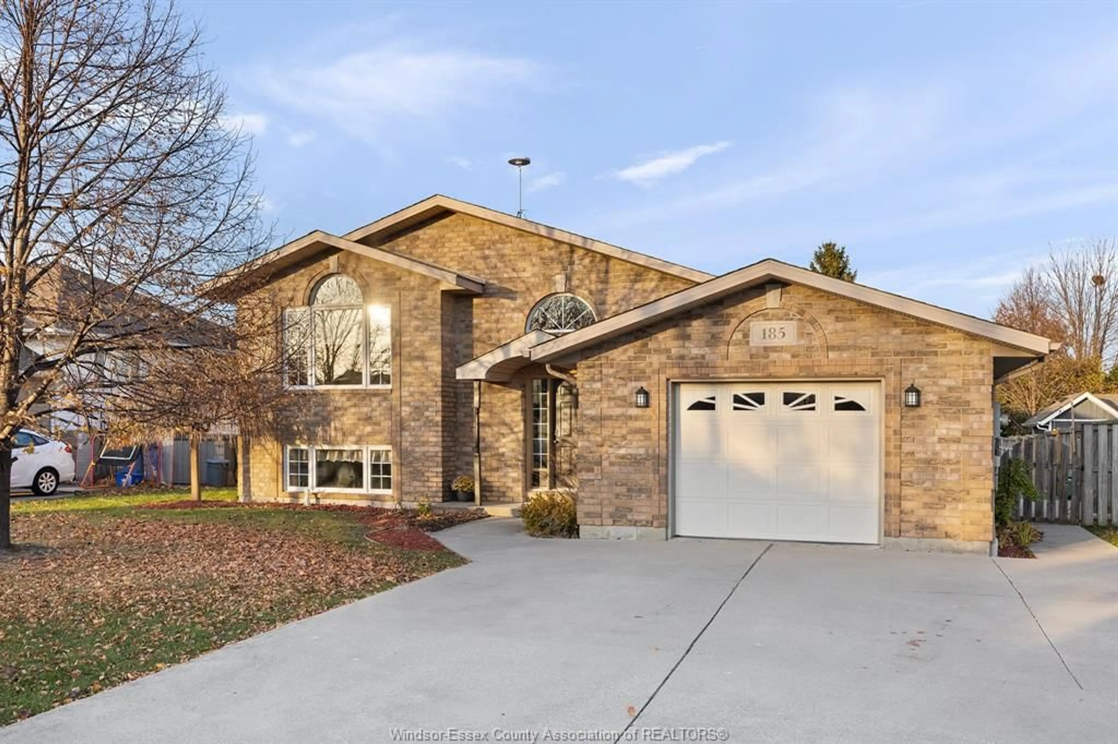 Home with brick exterior material, street for 185 WOODVIEW Dr, Essex Ontario N8M 3E9