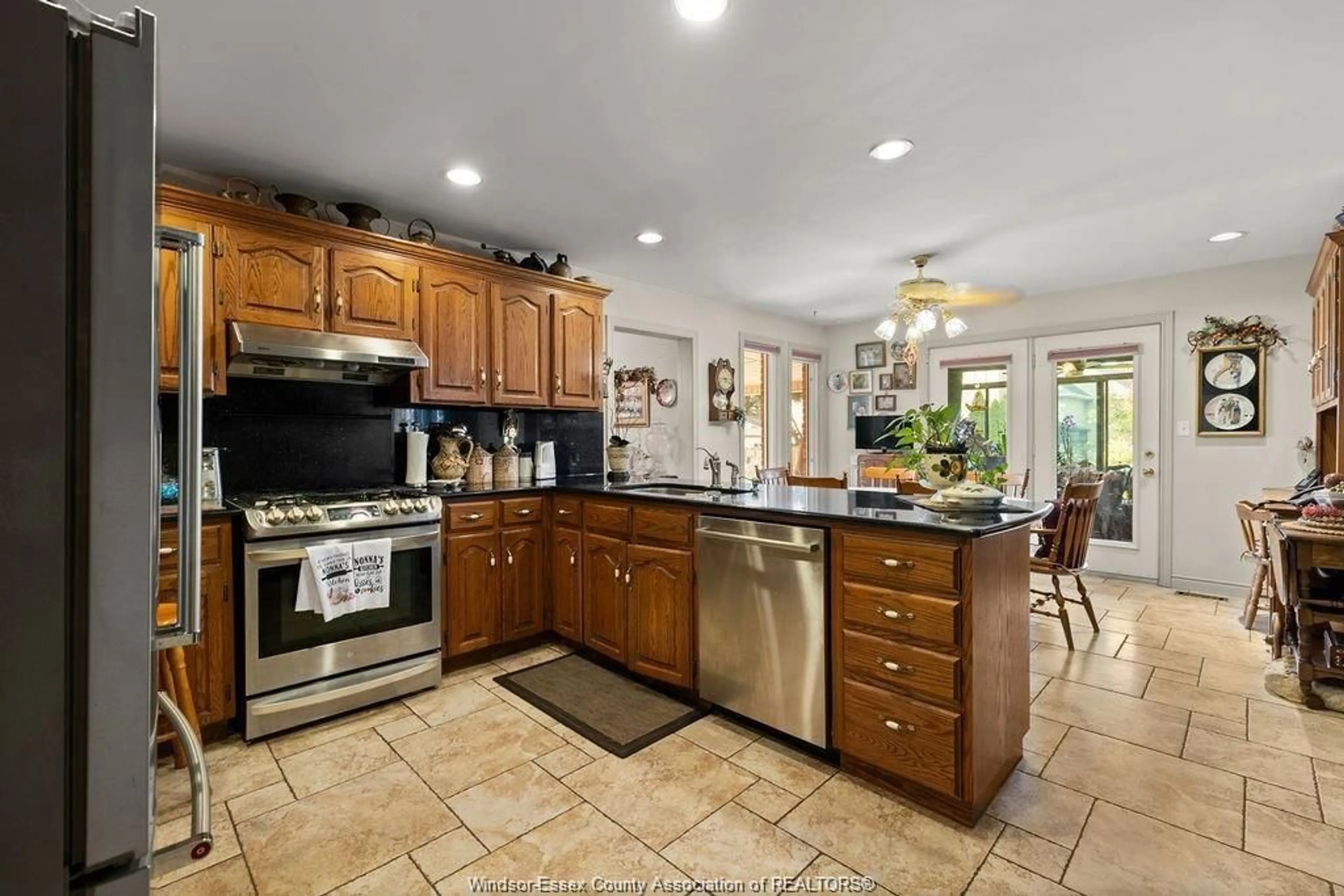 Open concept kitchen, ceramic/tile floor for 446 CORBETT, Tecumseh Ontario N8N 4T4