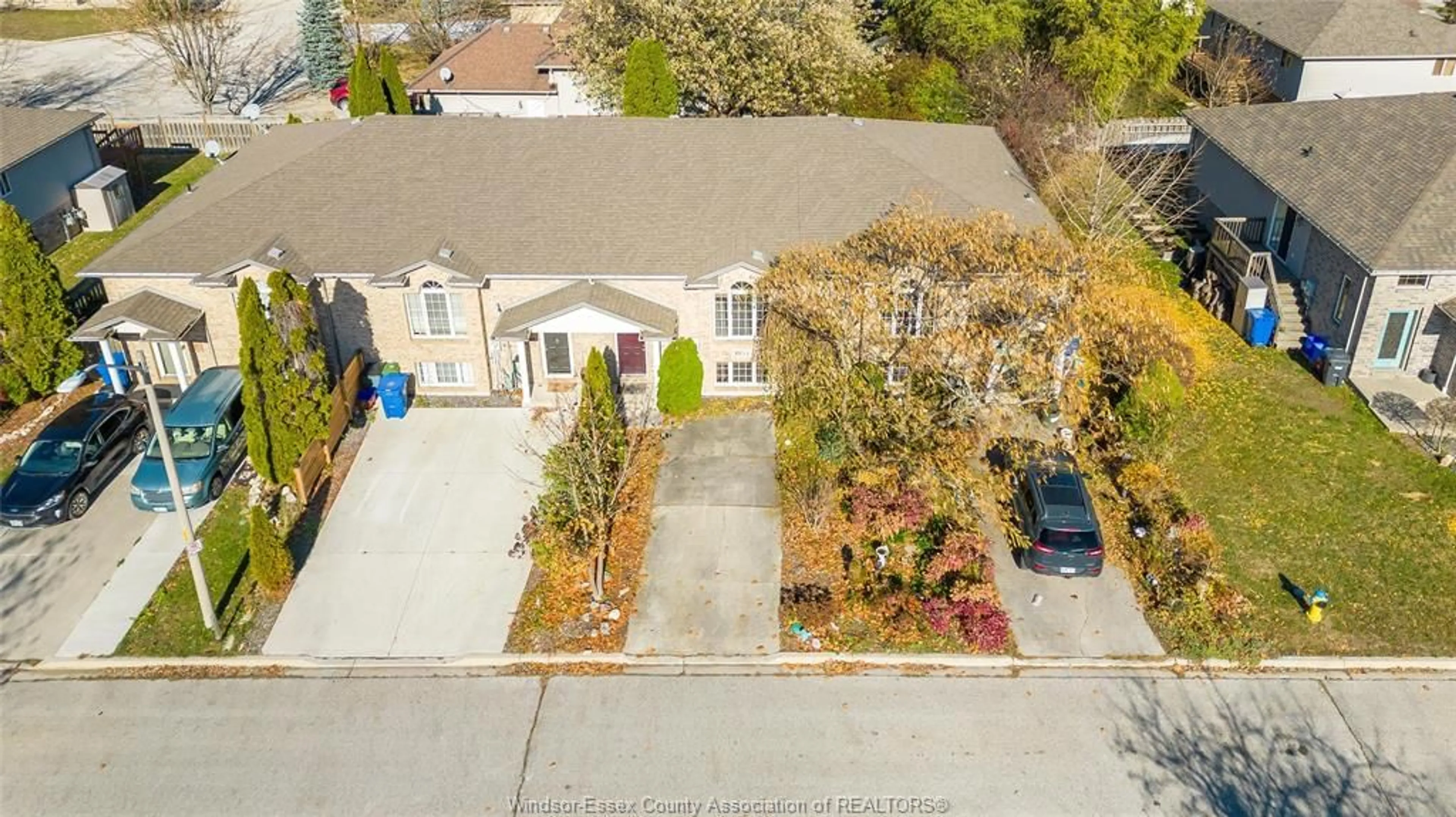 A pic from outside/outdoor area/front of a property/back of a property/a pic from drone, street for 1034 KING RICHARD Crt, Lakeshore Ontario N0R 1A0